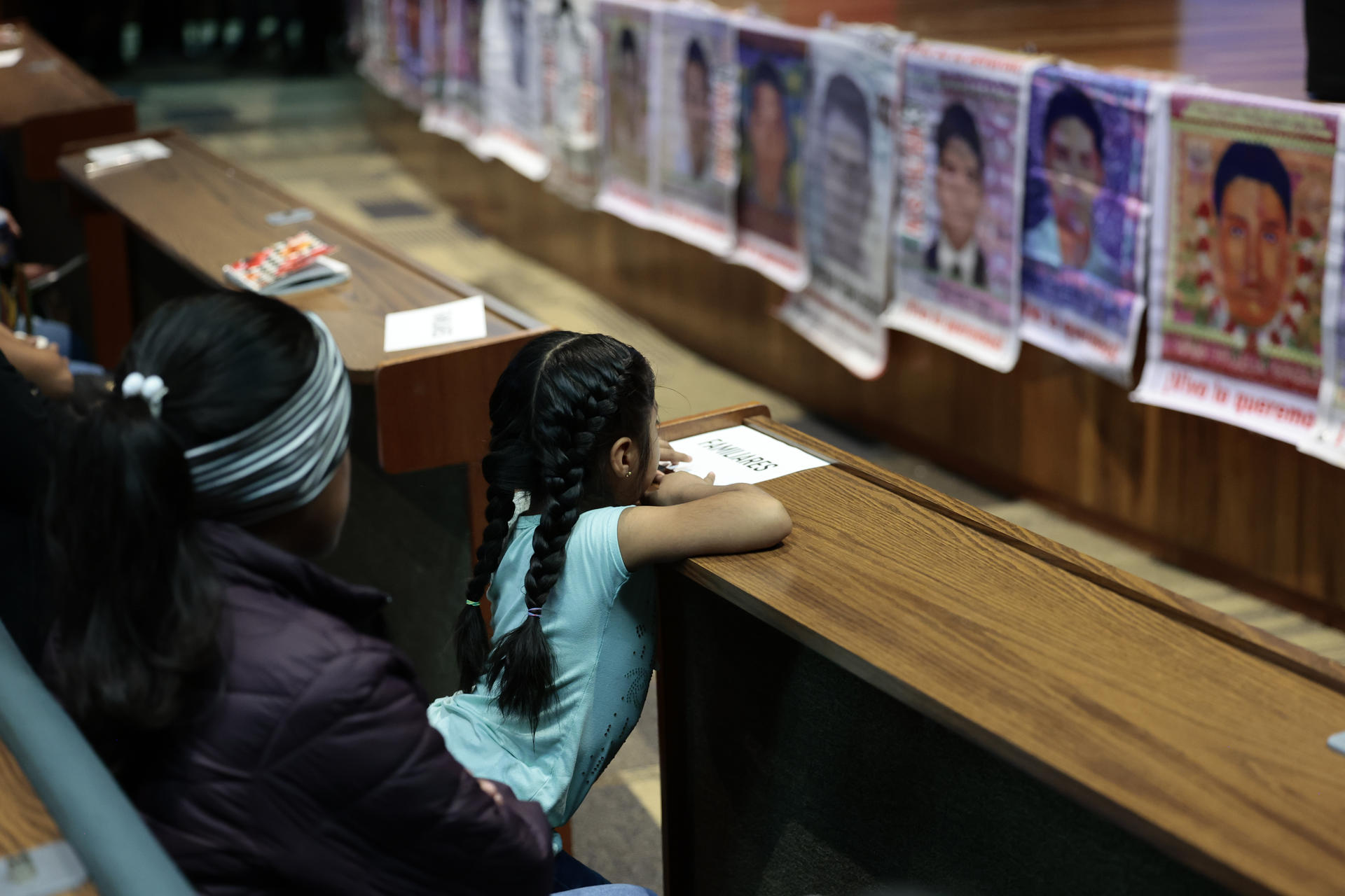Relatives of the 43 missing Ayotzinapa students attend the presentation of the sixth and last report of the Interdisciplinary Group of Independent Experts (GIEI), in Mexico City, Mexico, 25 July 2023. EFE/José Méndez