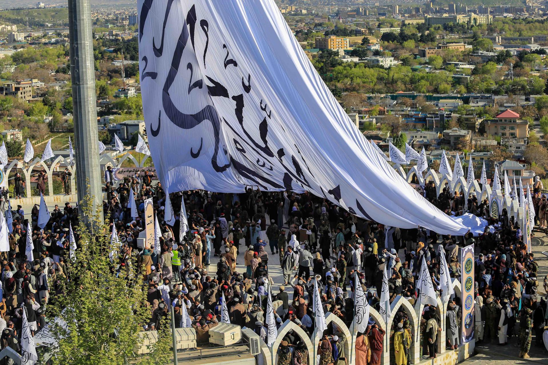Taliban attend a ceremony to hoist largest flag and emblem of the Islamic Emirate of Afghanistan, in Kabul, Afghanistan, 31 March 2022. EFE/EPA/FILE/STRINGER