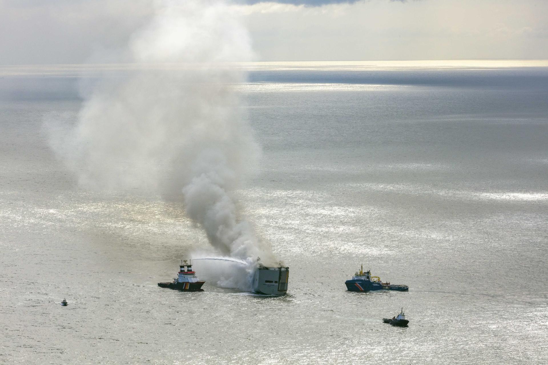 An aerial view shows fire extinguishing operation taking place as smoke rises from the Fremantle Highway cargo ship, in the North Sea, Ameland, the Netherlands, 16 July 2023. EFE/EPA/Flying Focus BV