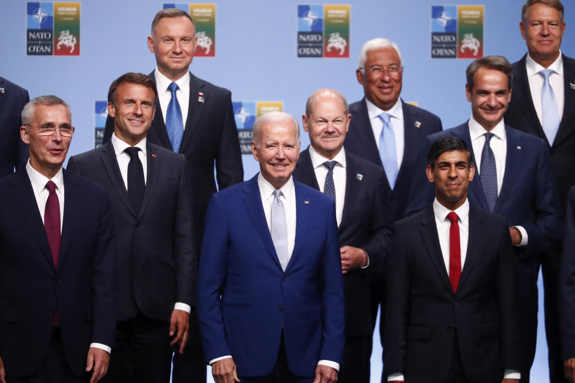 (L-R) NATO Secretary General Jens Stoltenberg along with French President Emmanuel Macron, Polish President Andzej Duda, US President Joe Biden, Gerrman Federal Chancellor Olaf Scholz, Portuguese Prime Minister Antonio Costa, British Prime Minister Rishi Sunak, Greek Prime Minister Kyriakos Mitsotakis and the President of Romania Klaus Iohannis pose for a group photo at the NATO summit in Vilnius, Lithuania, 11 July 2023. EFE/EPA/TOMS KALNINS