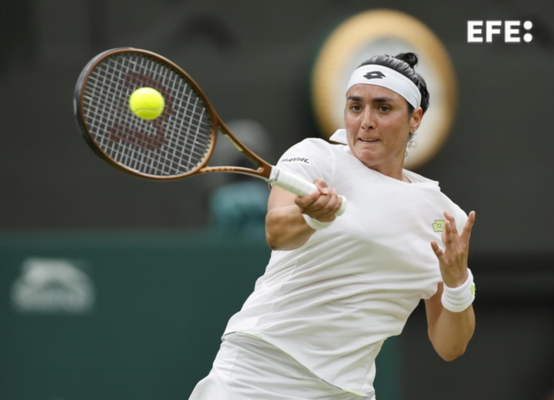 Ons Jabeur hits a return to Marketa Vondrousova during the ladies singles final at the Wimbledon Championships in London on 15 July 2023. EFE/EPA/TOLGA AKMEN/EDITORIAL USE ONLY
