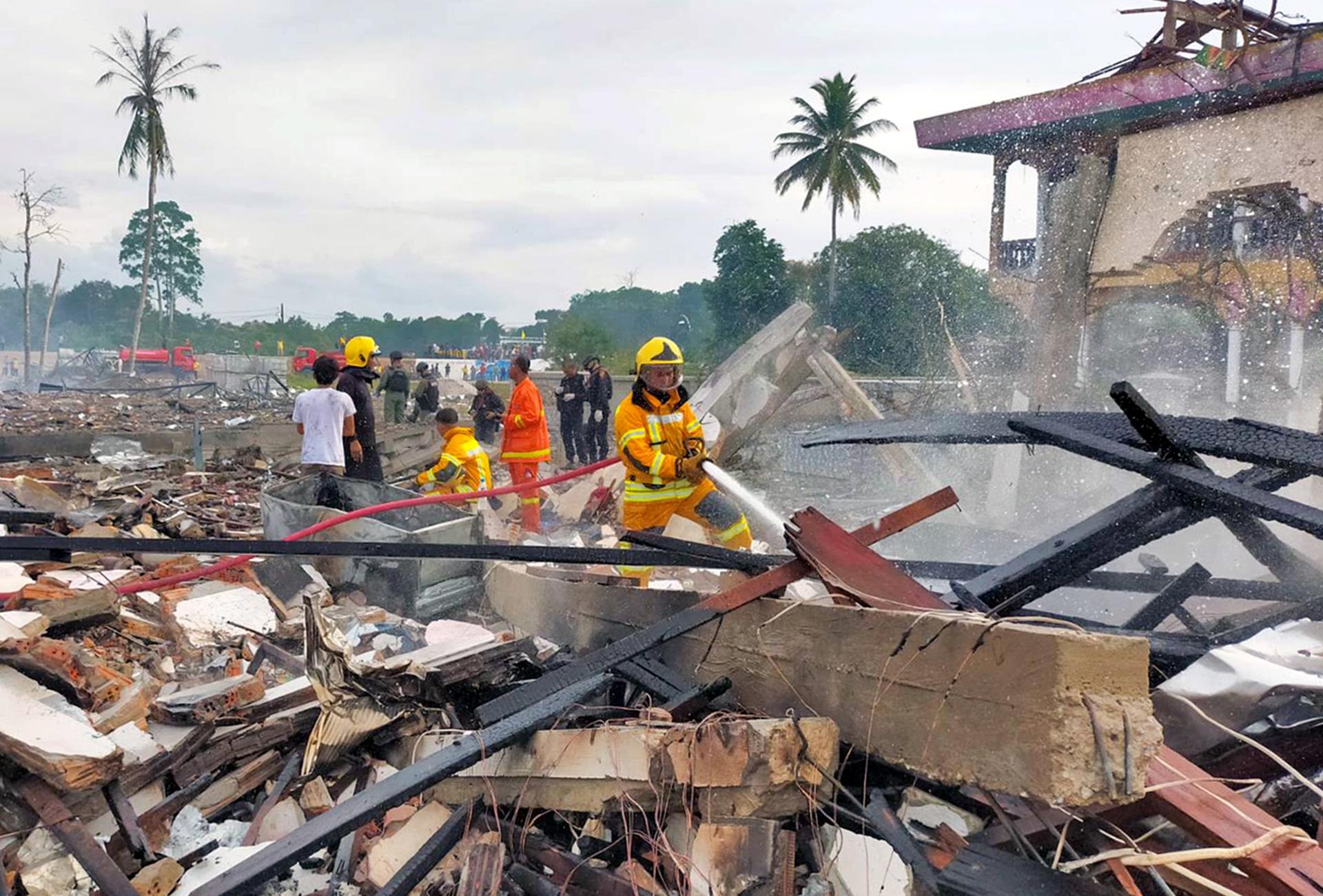 A handout photo made available by Pasemas rescue group shows Thai firefighters extinguishing a fire after an explosion at a firework warehouse in Sungai Kolok district, Narathiwat province, southern Thailand, 29 July 2023. EFE/EPA/PASEMAS RESCUE GROUP HANDOUT HANDOUT EDITORIAL USE ONLY/NO SALES
