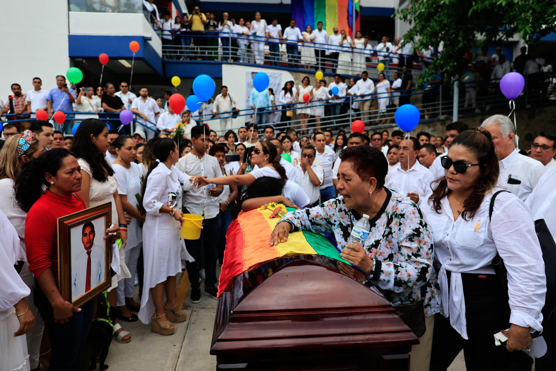 Family and friends farewell murdered teacher Ulises Salvador Nava Juárez at the facilities of the General Coordination of the South Zone (UAGro) in the resort of Acapulco, Mexico, on July 17, 2023. EFE/ David Guzman