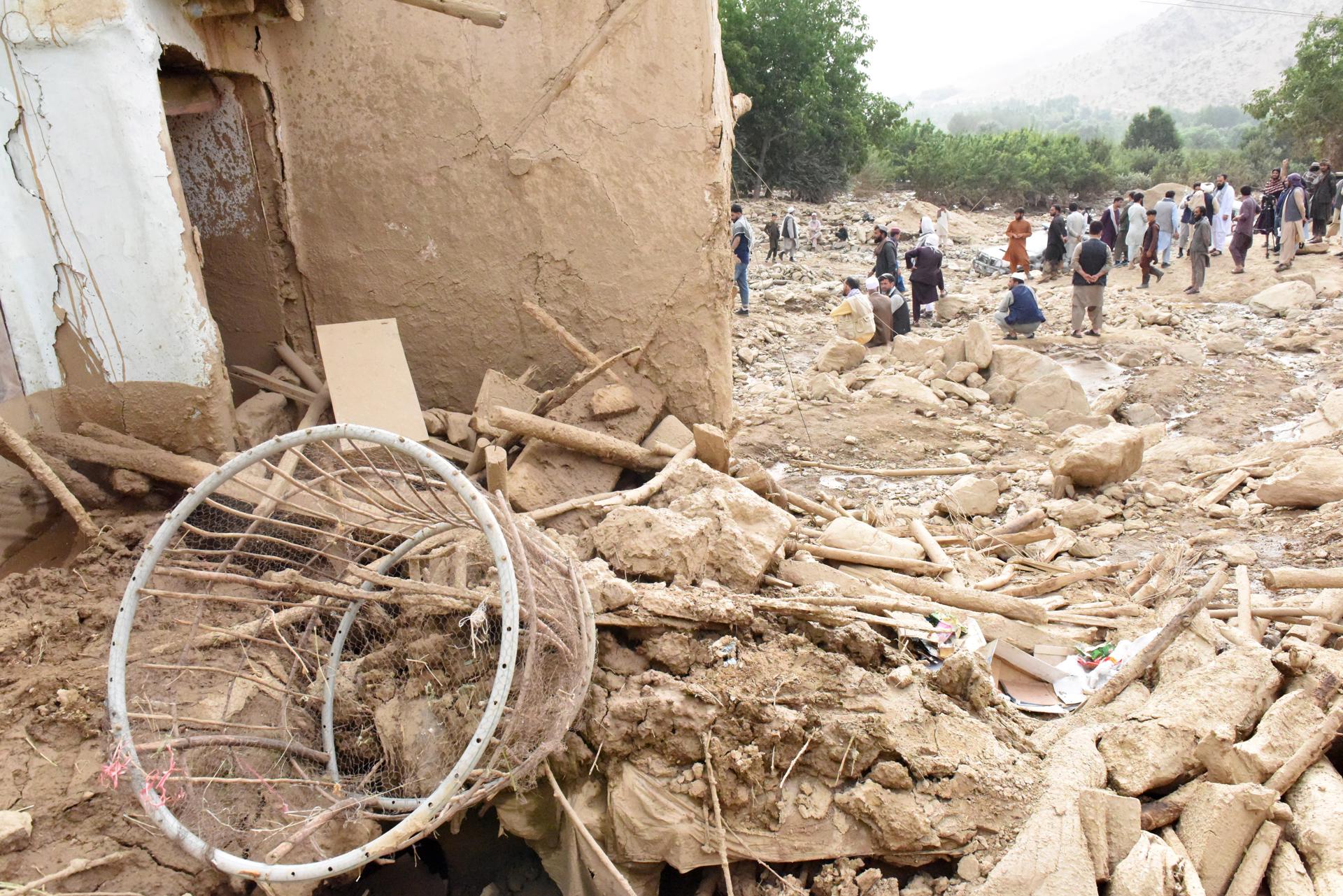Afghans survey the damage caused to their properties following flash floods and heavy rains in Maidan Wardak, Afghanistan, 23 July 2023 (issued 24 July 2023). EFE-EPA/SAMIULLAH POPAL 23008