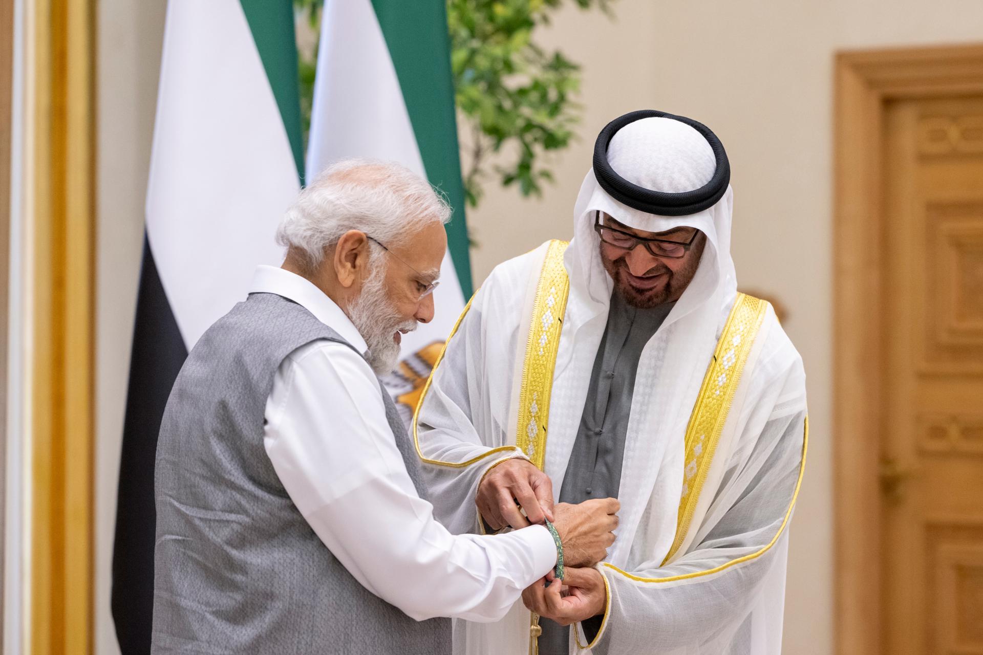 A handout photo made available by the UAE's Presidential Court shows President of the United Arab Emirates and Ruler of the emirate of Abu Dhabi Sheikh Mohamed bin Zayed Al Nahyan (R) meeting with Indian Prime Minister Narendra Modi (L), in Abu Dhabi, United Arab Emirates, 15 July 2023. EFE-EPA/UAE PRESIDENTIAL COURT HANDOUT "??? ?????? ??????? ??????? ?? ????? ??????? ????? ????? ??? ?? ??? ???????? ????????? ? / ?? ????????? ?????? ??????? ?????? ?? ?????? ??????. ??? ???? ??????? ??????? ???? ??? ???? ??? ???? ????????? ?? ???? ?????? ?? ?????? ?? ??????? ?? ????? ???? ???????? ?? ?????? ?? ???? ??????? ????? ?? ???? ??????? ?? ??????? ???? ????? ????? ???? ?? ???? ?? ????? ???? ???? ???????? ??????? ???????? ?? ????? ?????? ?? ????? ???????? ??????? ??????? ?? ?? ??? ???? ?????? ?? ??????". 
"This official UAE Presidential Court photograph is being made available only for publication by news organizations and/or for pe HANDOUT EDITORIAL USE ONLY/NO SALES