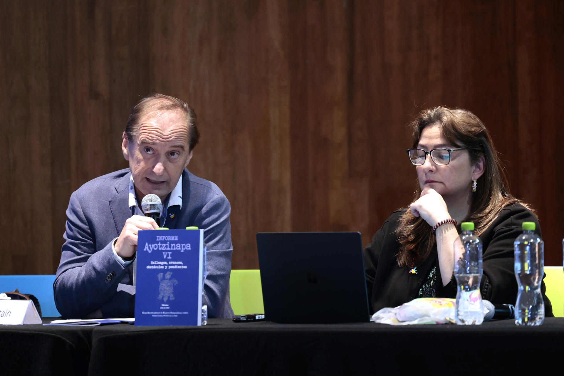 Carlos Beristain (L) and Angela Buitrago, representatives of the Interdisciplinary Group of Independent Experts (GIEI), present the sixth and last report on the Ayotzinapa case, in Mexico City, Mexico, 25 July 2023. EFE/José Méndez
