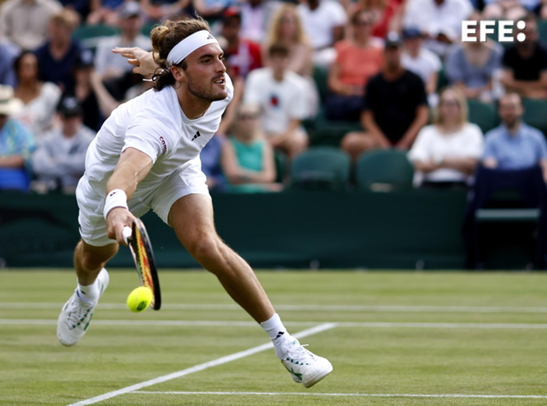 Stefanos Tsitsipas in action against Laslo Djere during their third round match at the Wimbledon Championships in London on 8 July 2023. EFE/EPA/TOLGA AKMEN EDITORIAL USE ONLY
