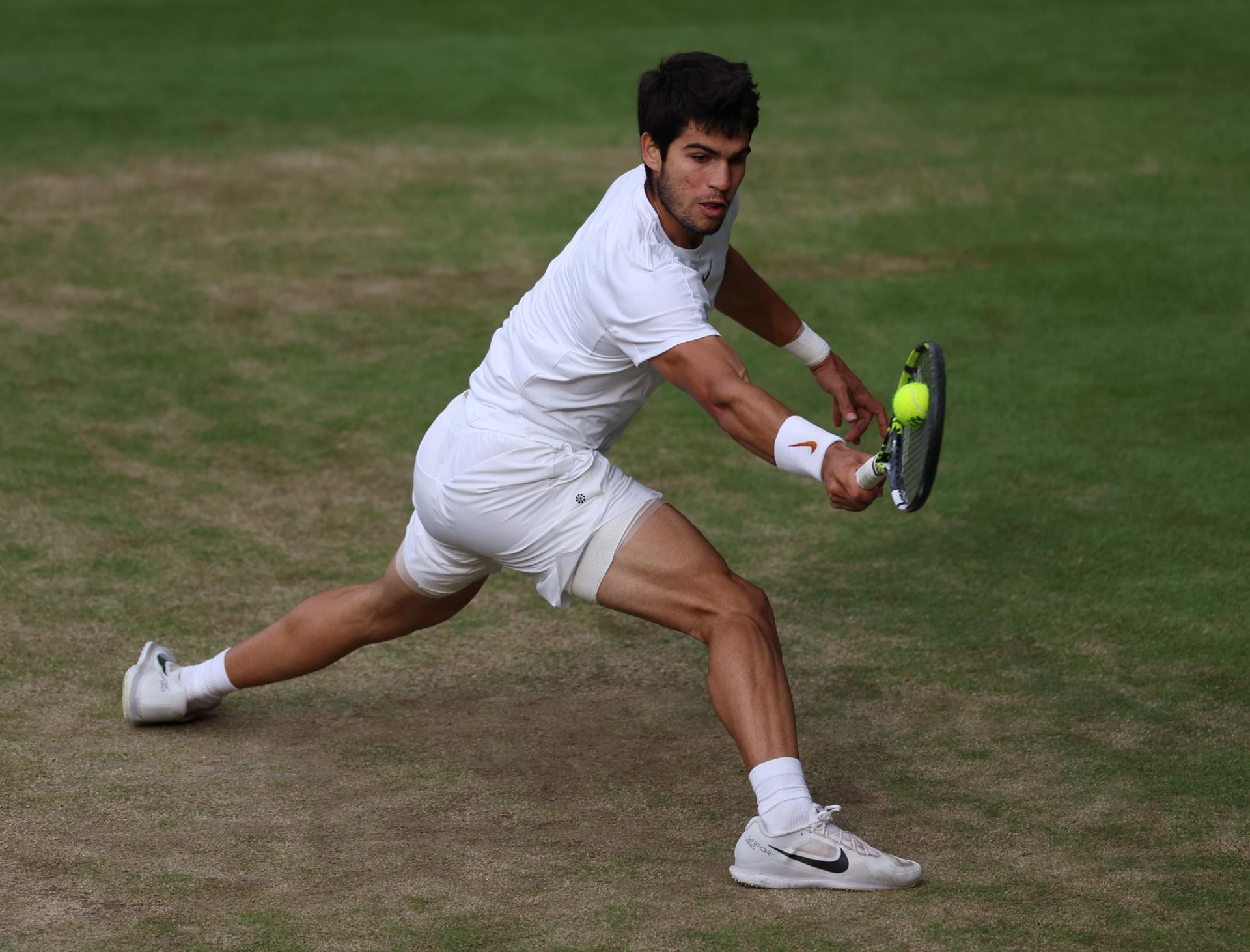 Carlos Alcaraz in action against Novak Djokovic in the men's final at the Wimbledon Championships in London on 16 July 2023. EFE/EPA/ISABEL INFANTES/EDITORIAL USE ONLY
