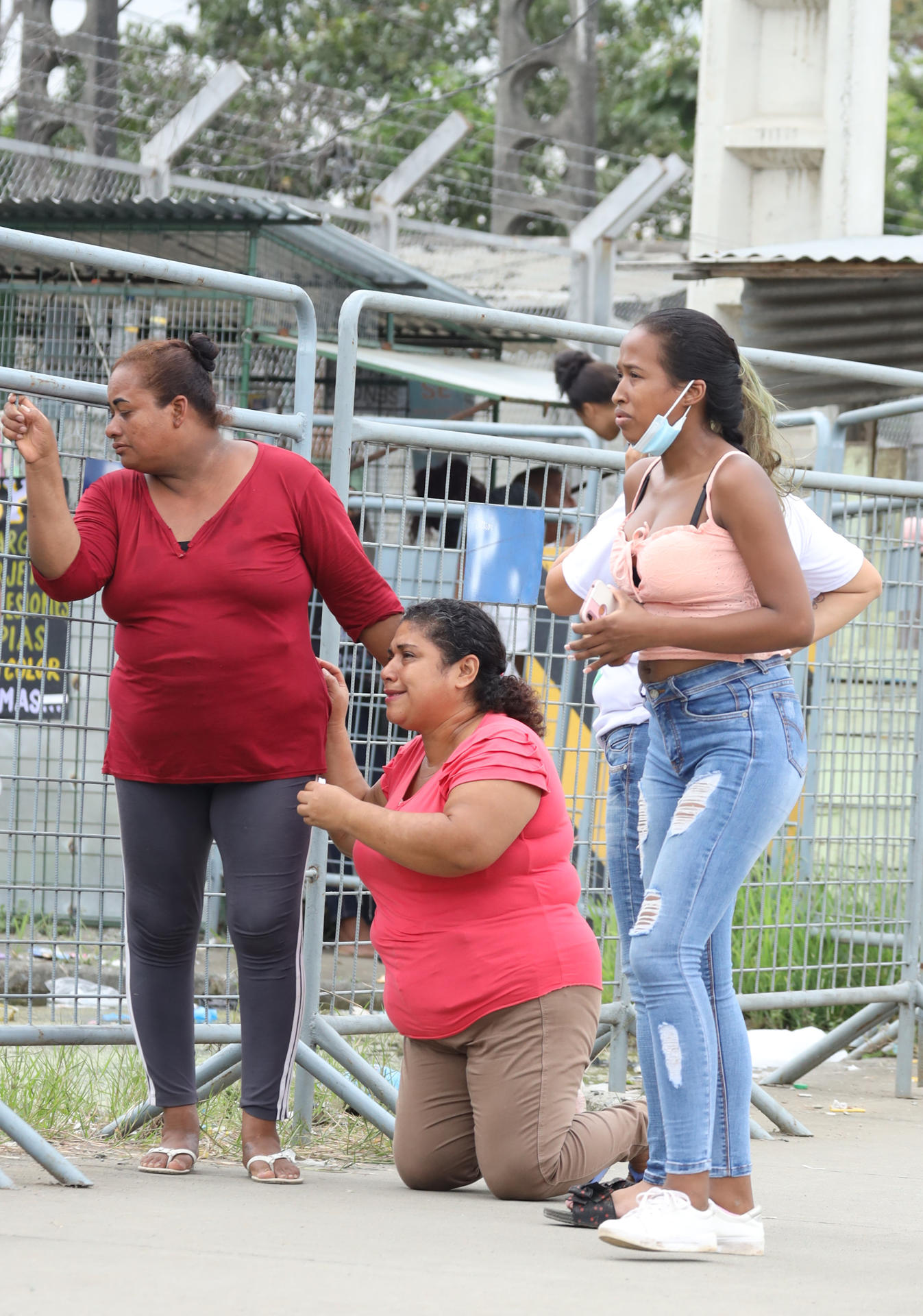 Relatives of inmates wait for information outside the prison in the city of Guayaquil, Ecuador, on 23 July, 2023. EFE-EPA/Jonathan Miranda
