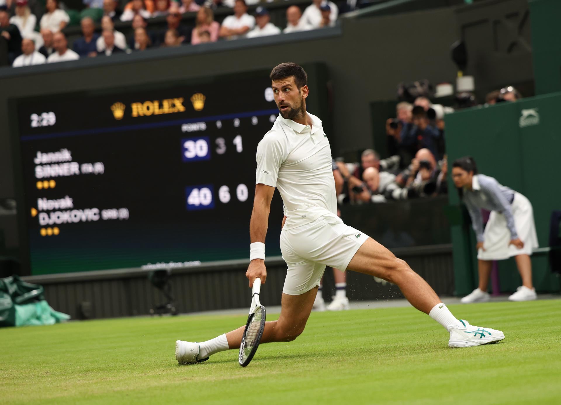 Novak Djokovic of Serbia in action during his men's singles Wimbledon semifinal match against Jannik Sinnner of Italy on 14 July 2023 in London, United Kingdom. Djokovic won 6-3, 4-6, 7-6 (7-4). EFE/EPA/NEIL HALL EDITORIAL USE ONLY
