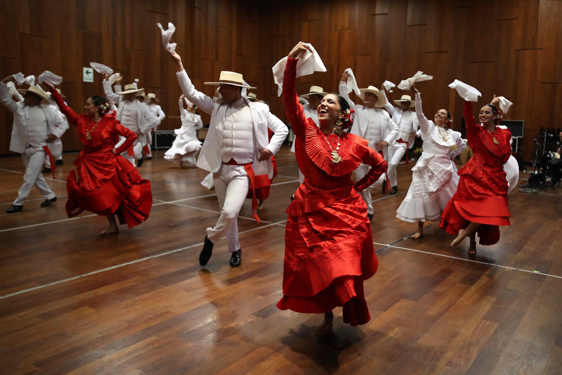 Members of Peru's National Folkloric Ballet on 10 July 2023 rehearse the country's famed marinero partner dance, which is part of the "Retablo de Fiestas Patrias" spectacle that will be performed between 21 July 2023 and 30 July 2023 at the Grand National Theater in Lima, Peru. EFE/Paolo Aguilar
