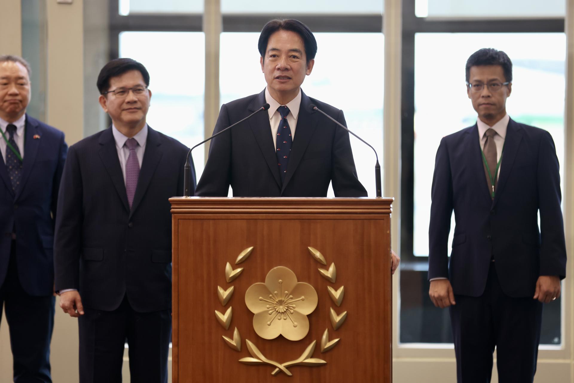 Taiwan's Vice President William Lai (C) speaks prior to his departure to Paraguay inside the Terminal of Taoyuan international Airport in Taoyuan, Taiwan, 12 August 2023. EFE-EPA/RITCHIE B. TONGO
