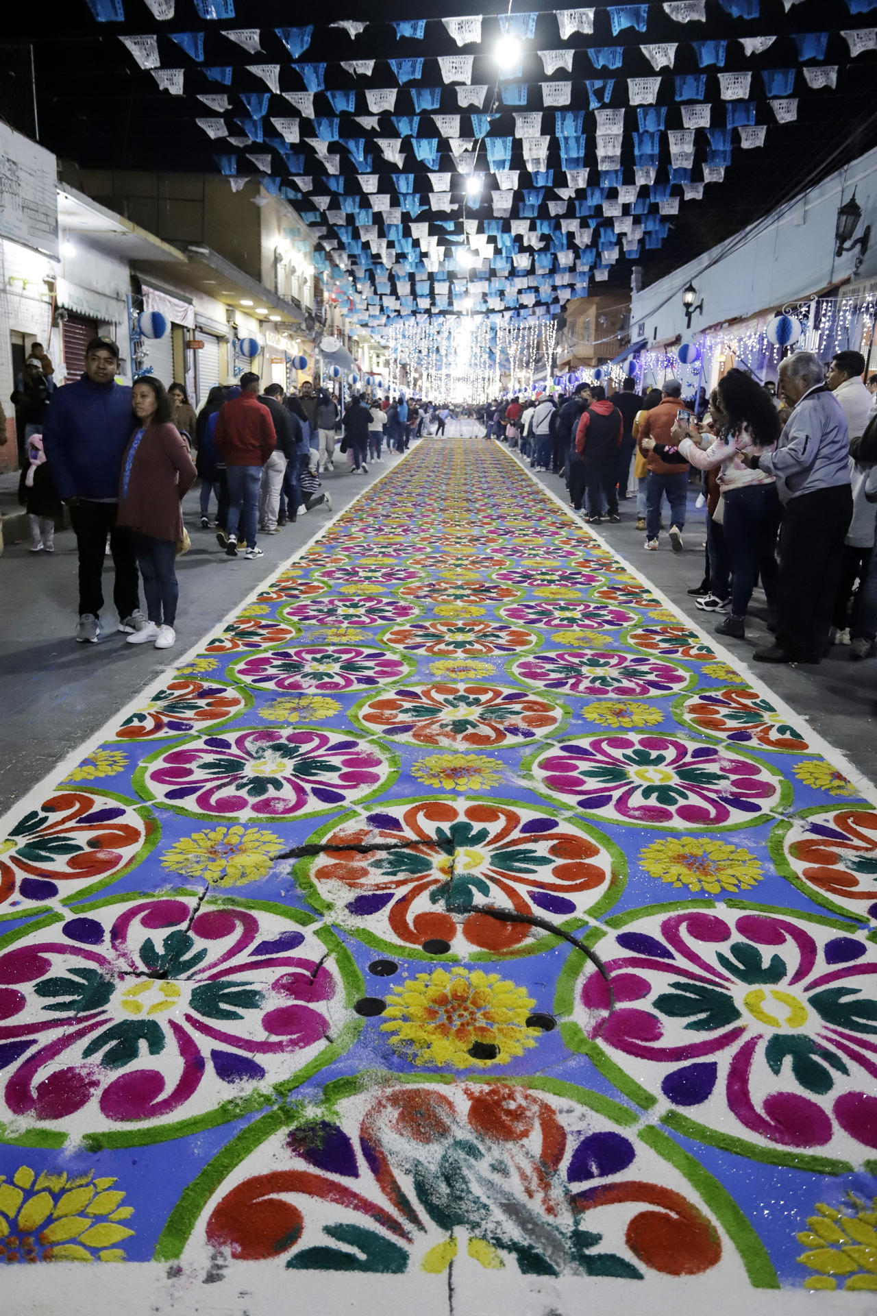 A 14 August 2023 photo of a colorful sawdust carpet in the central Mexican city of Humantla. EFE /Hilda Ríos
