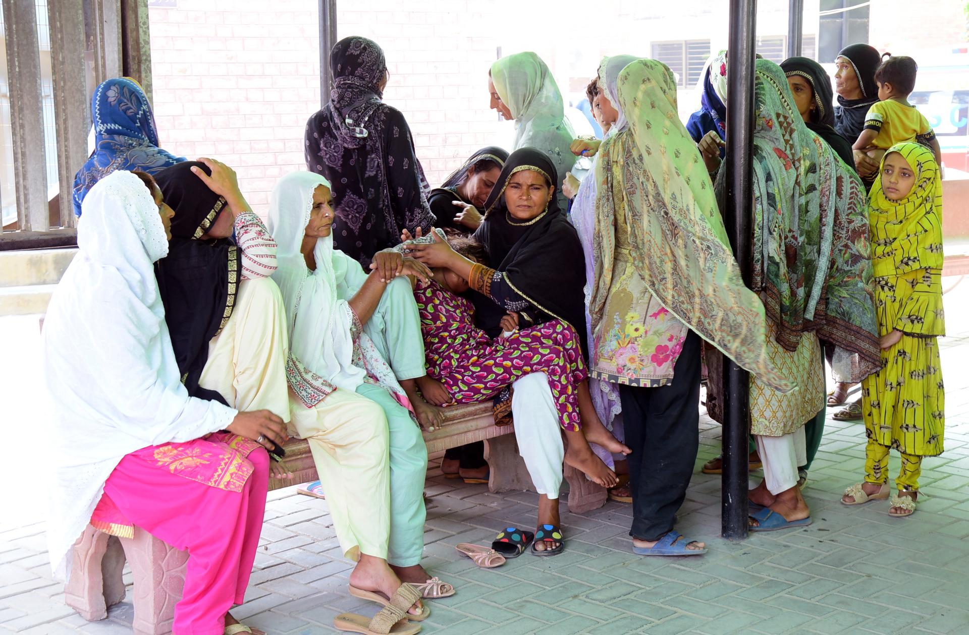 Relatives of the victims of a bus accident gather at a hospital in Pindi Bhattian, Pakistan, 20 August 2023. EFE/EPA/ISRAR UL HAQ
