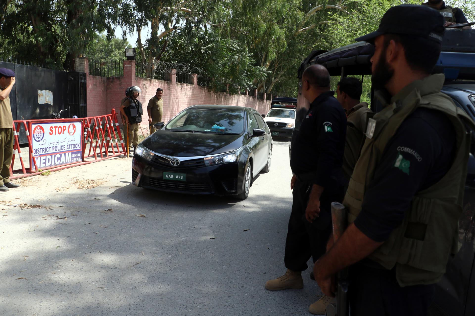 Police escort special court judge Abual Hasnat Muhammad Zulqarnain to a prison for a hearing in a case against imprisoned Imran Khan, the former prime minister and chairman of Pakistan Tehrik-e-Insaf (PTI) political party, in Attock, Pakistan, 30 August 2023. EFE-EPA/SOHAIL SHAHZAD
