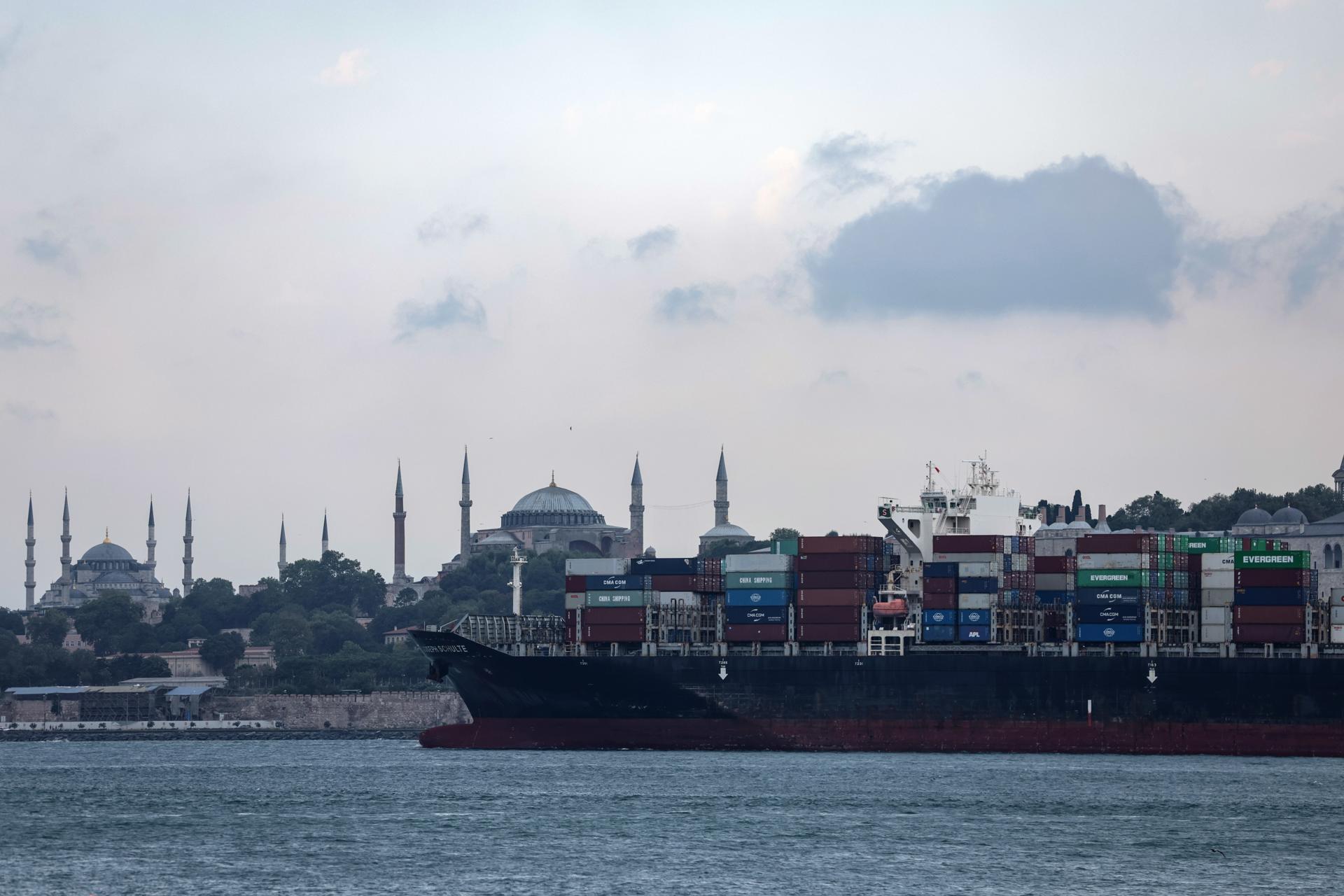 The Hong Kong-flagged Joseph Schulte, the first cargo ship to leave Ukraine's Odesa port since the end of the grain deal despite Russian threats, sails in front of the Hagia Sophia Grand Mosque and the Blue Mosque on the Bosphorus in Istanbul, Turkey, 18 August 2023. EFE-EPA/ERDEM SAHIN