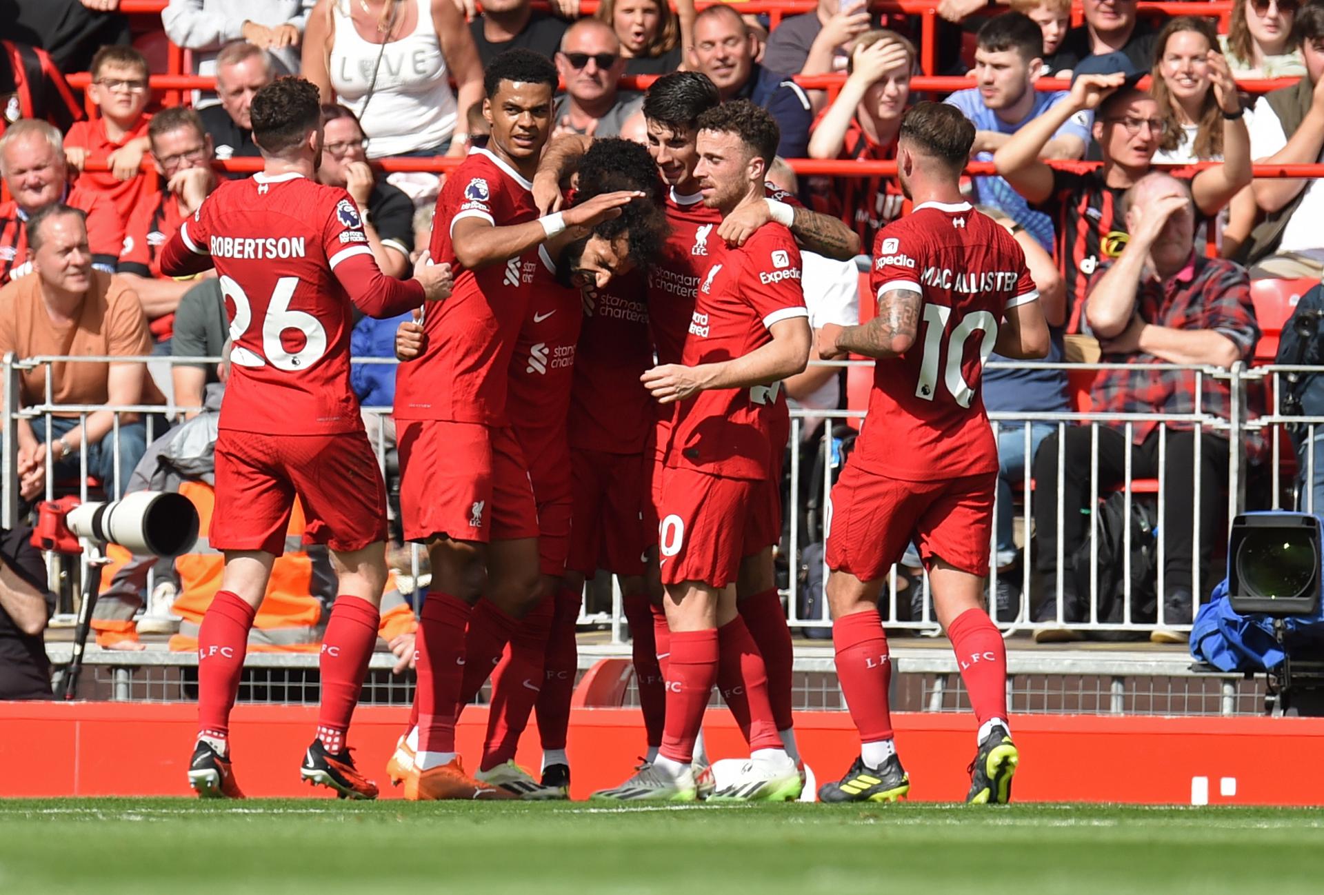 Mohamed Salah (C) of Liverpool celebrates with teammates after scoring the 2-1 lead goal during the English Premier League soccer match between Liverpool FC and AFC Bournemouth, in Liverpool, Britain, 19 August 2023. EFE/EPA/PETER POWELL EDITORIAL USE ONLY. No use with unauthorized audio, video, data, fixture lists, club/league logos or 'live' services. Online in-match use limited to 120 images, no video emulation. No use in betting, games or single club/league/player publications.