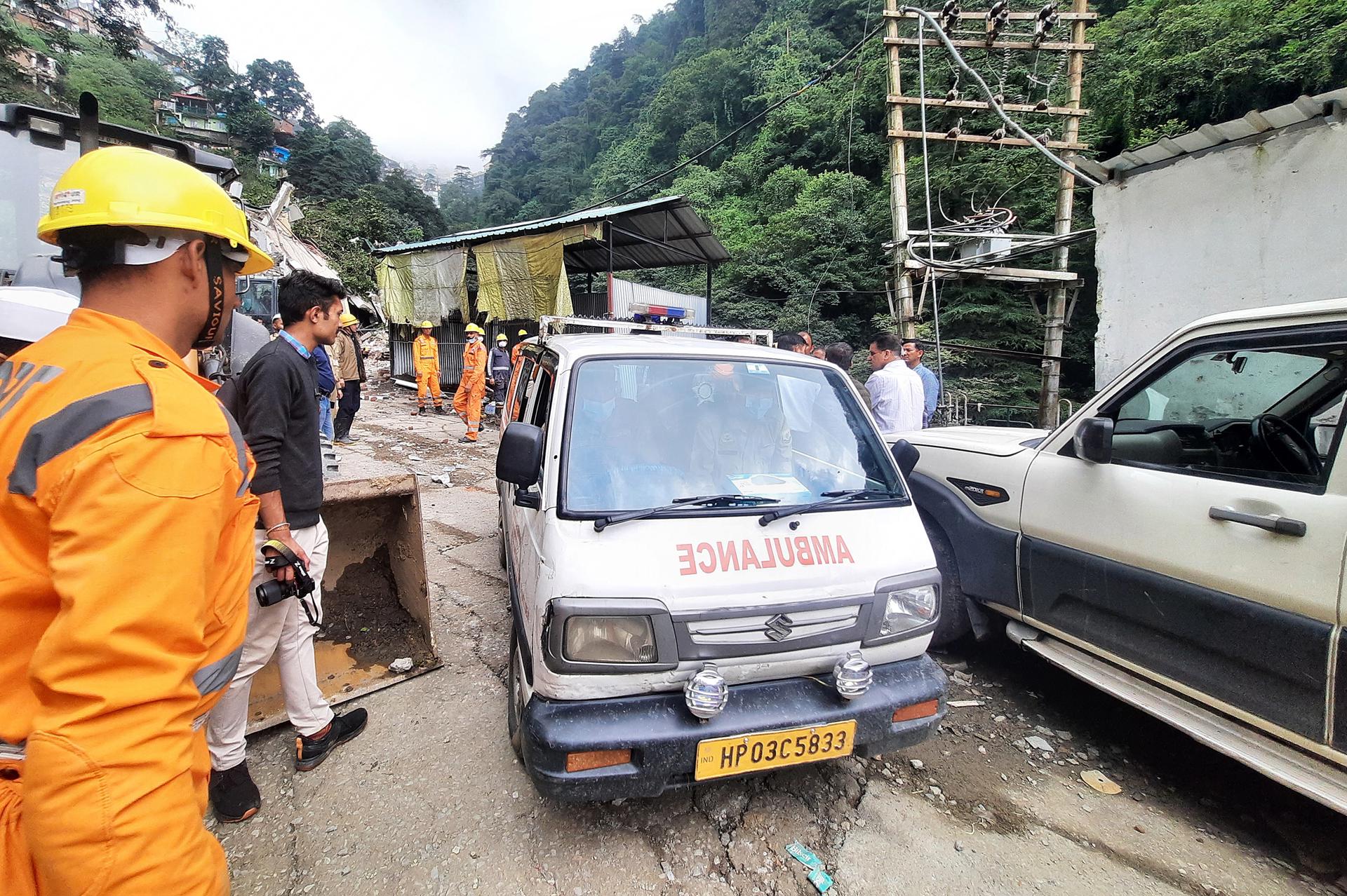 An ambulance drives as rescue operations continue after a landslide in Shimla, Himachal Pradesh, India, 16 August 2023. EFE/EPA/STR