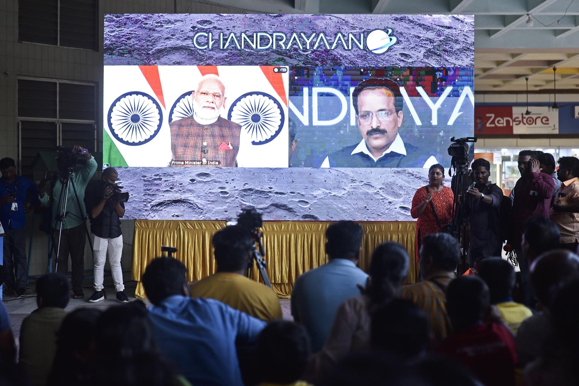 People watch the live-streaming of Indian Space Research Organisation's (ISRO) mission Chandrayaan-3's soft landing on Moon's South Pole, at Tamil Nadu Science and Technology Centre, in Chennai, India, 23 August 2023. EFE-EPA/IDREES MOHAMMED