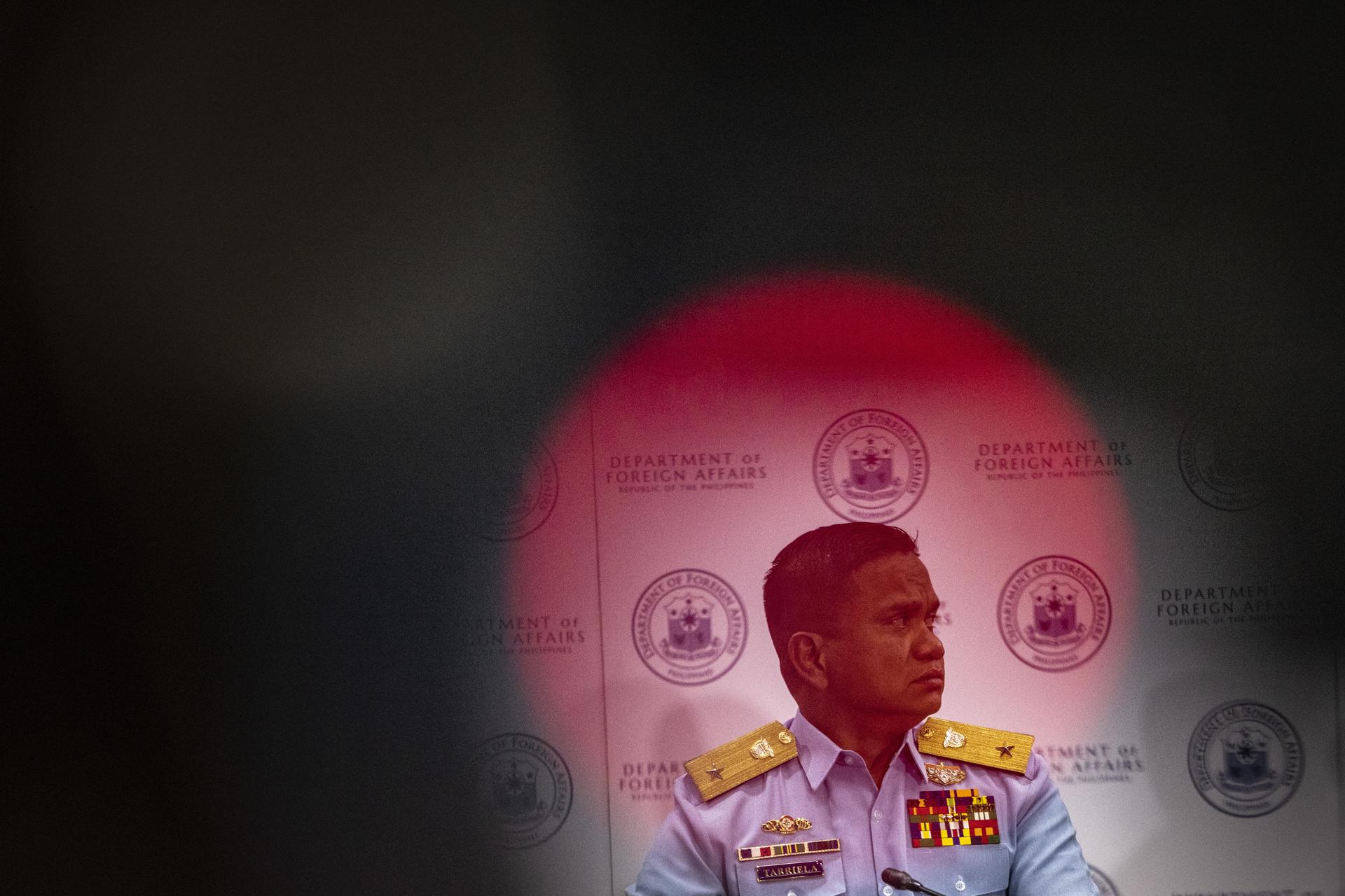 Philippine Coast Guard (PCG) Commodore Jay Tarriela, spokesperson for the West Philippine Sea, listens during a press conference at the Department of Foreign Affairs office in Manila, Philippines, 07 August 2023. EFE-EPA/EZRA ACAYAN / POOL