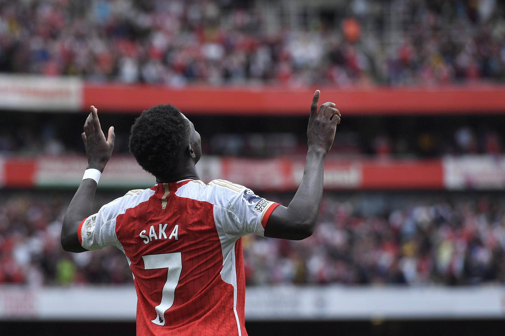 Bukayo Saka celebrates his potent strike from outside the area that gave Arsenal a 2-0 lead over Nottingham Forest in Premier League Matchday 1 action on 12 August 2023 at Emirates Stadium in London. Arsenal won 2-1. EFE/EPA/VINCE MIGNOTT.