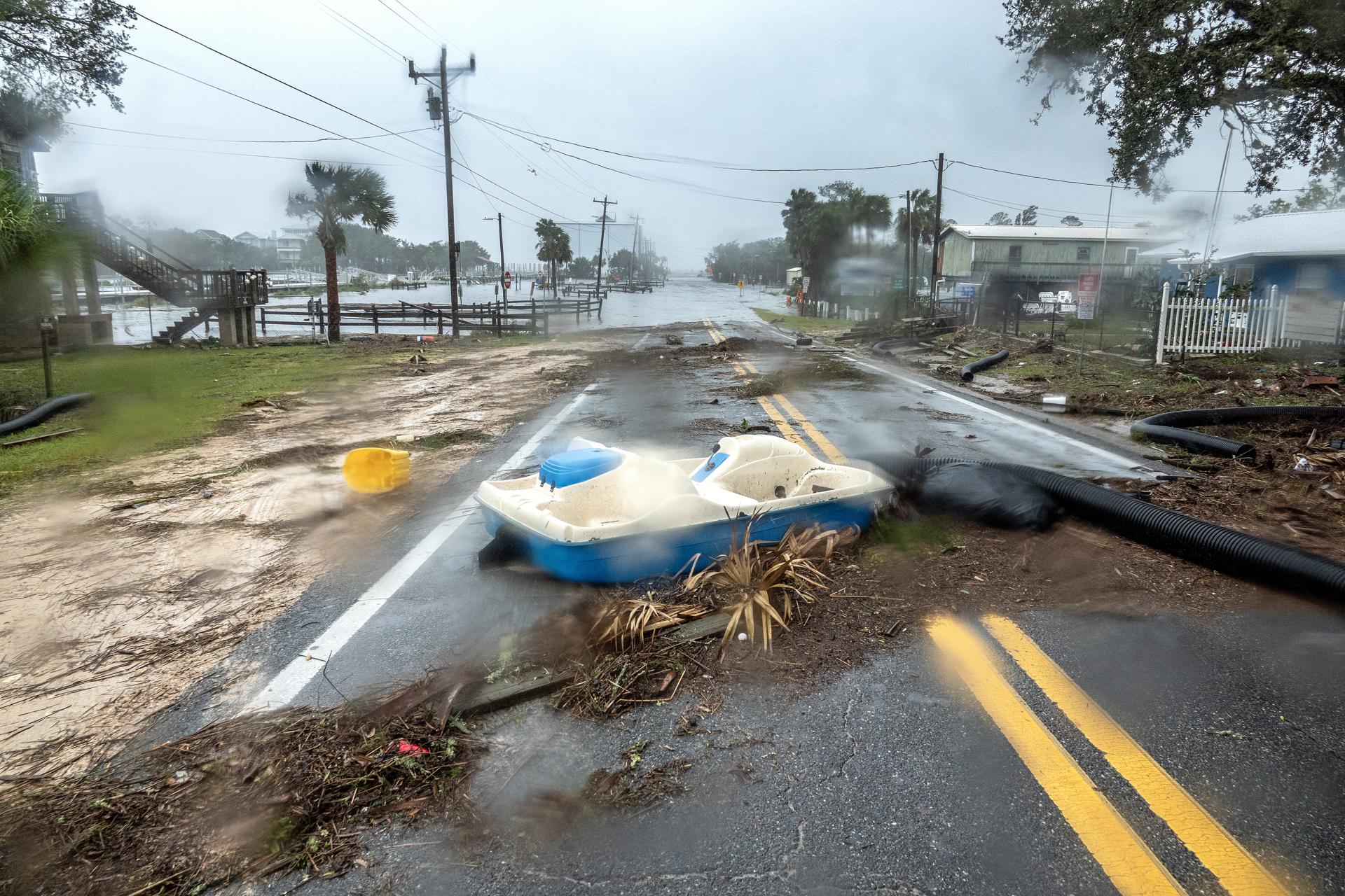 A road is full of debris and flooded in the town of Jena, after Hurricane Idalia made landfall near Keaton Beach, Florida, USA, 30 August 2023. EFE/EPA/CRISTOBAL HERRERA-ULASHKEVICH