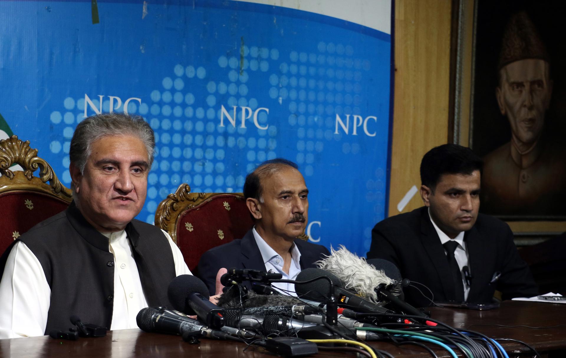 Shah Mehmood Qureshi (L), vice chairman of opposition party Pakistan Tehrik-e-Insaf sits with Shoaib Shaheen (C) and Naeem Haider Panjutha, lawyers of former Prime Minister and PTI head Imran Khan, during a press conference in Islamabad, Pakistan, 07 August 2023. EFE/EPA/SOHAIL SHAHZAD