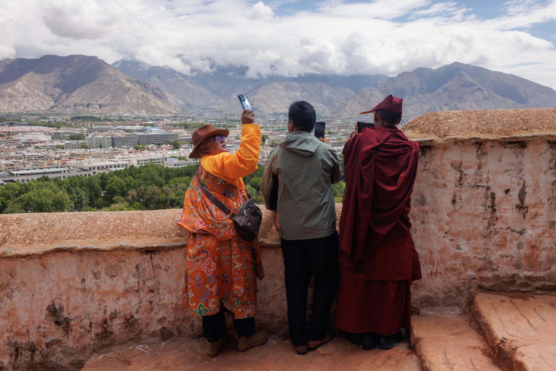 Pilgrims at the Potala Palace, in Lhasa, Tibet Autonomous Region, China, 16 June 2023. EFE/EPA/FILE/ALEX PLAVEVSKI
