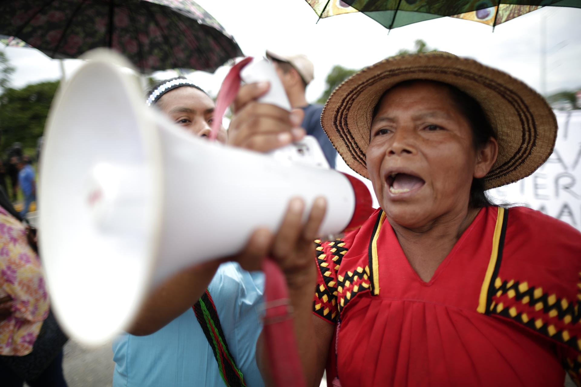 An indigenous protester addresses the crowd at a blockade indigenous people set up on the Inter-American Highway at San Juan Oriente, Panama, on Aug. 7, 2023. EFE/Bienvenido Velasco
