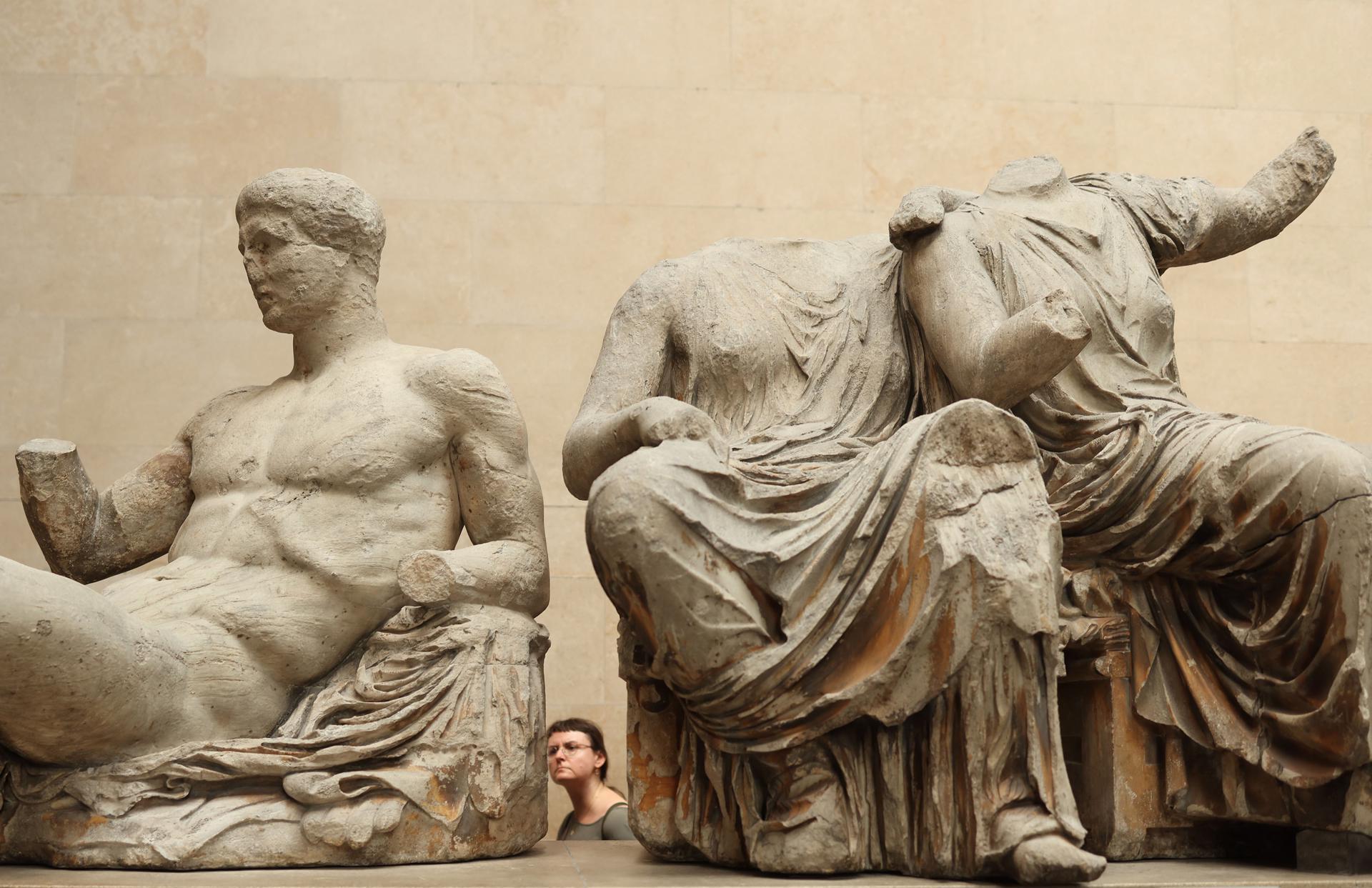 A woman views the Parthenon Marbles at the British Museum in London, Britain, 23 August 2023. EFE/EPA/NEIL HALL
