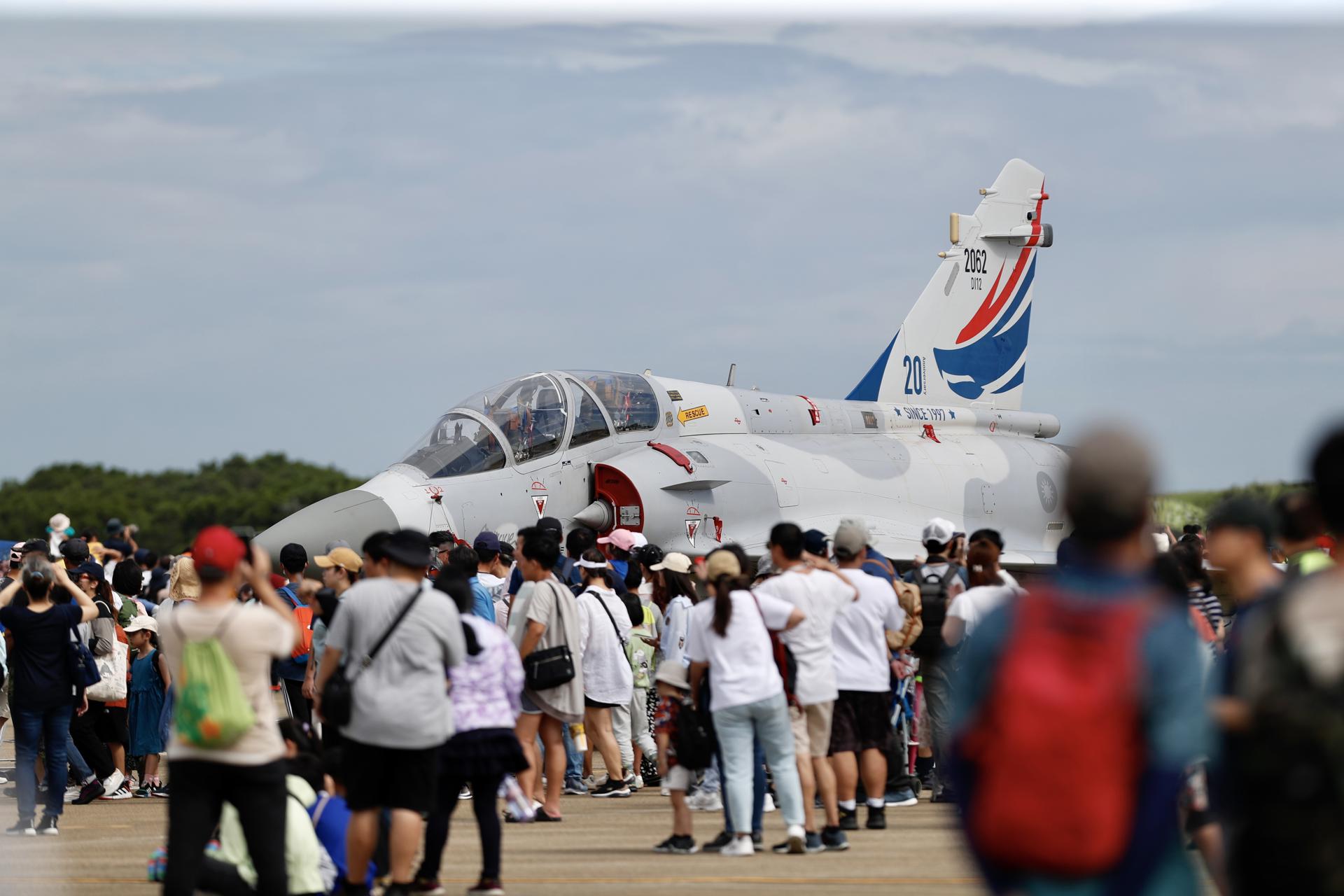 People look at Taiwan's Air force Mirage 2000 fighter jet during an open house event inside Taiwanese Air Base in Taichung, Taiwan, 12 August 2023. EFE-EPA/RITCHIE B. TONGO
