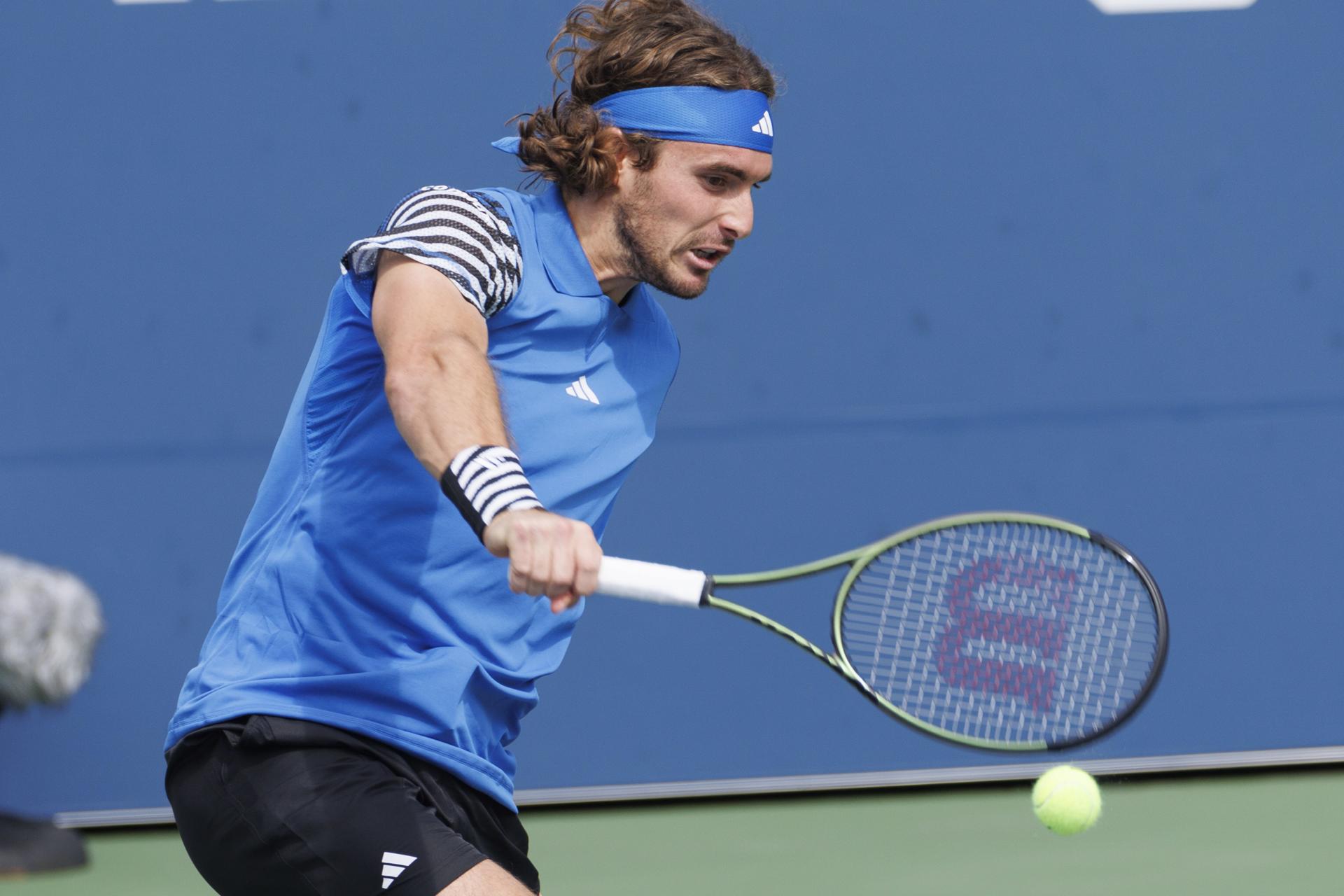 Stefanos Tsitsipas of Greece returns the ball to Dominic Stricker of Switzerland during their second round match at the US Open Tennis Championships at the USTA National Tennis Center in Flushing Meadows, New York, USA, 30 August 2023. EFE-EPA/CJ GUNTHER
