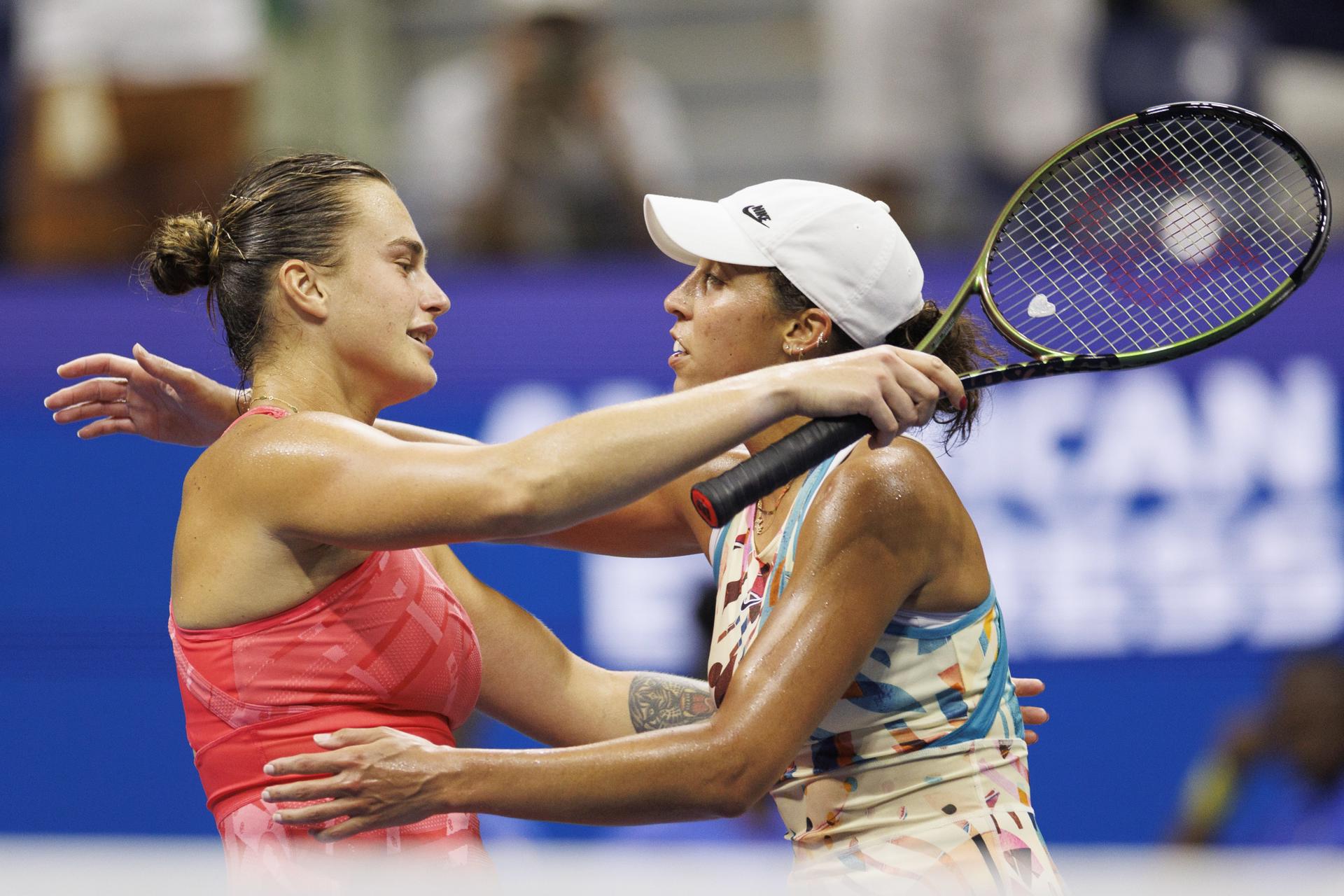 Aryna Sabalenka (L) of Belarus embraces Madison Keys (R) of the United States after Sabalenka defeated Keys in their semifinal round match at the US Open Tennis Championships at the USTA National Tennis Center in Flushing Meadows, New York, USA, 08 September 2023. EFE-EPA/CJ GUNTHER
