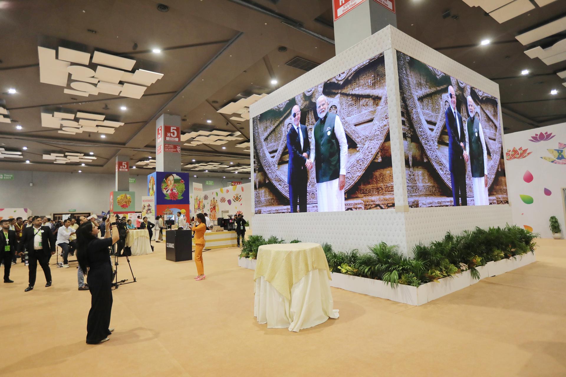 A giant screen installed at the International media center shows the German Chancellor Olaf Scholz welcomed by the Indian prime minister Narendra Modi at Bharat Mandapam at ITPO Convention Centre, Pragati Maidan, the venue of the G20 Summit in New Delhi, India, 09 September 2023. EFE-EPA/HARISH TYAGI
