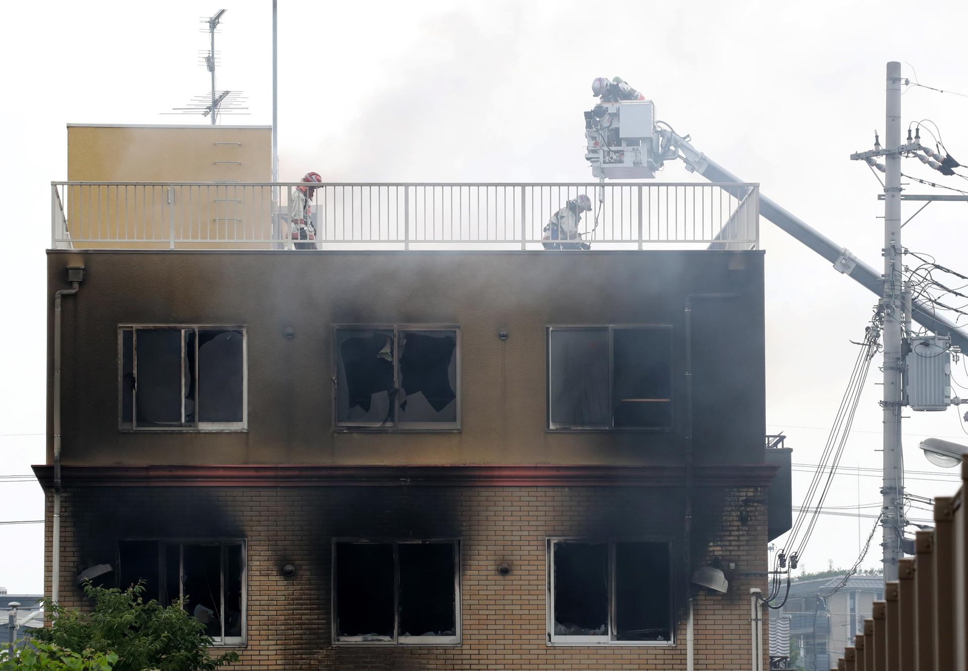 Firefighters searching for missing people at a three-story Kyoto Animation building which fire occurred, in Kyoto, western Japan, 18 July 2019. EFE-EPA FILE/JIJI JAPAN OUT EDITORIAL USE ONLY/NO ARCHIVES