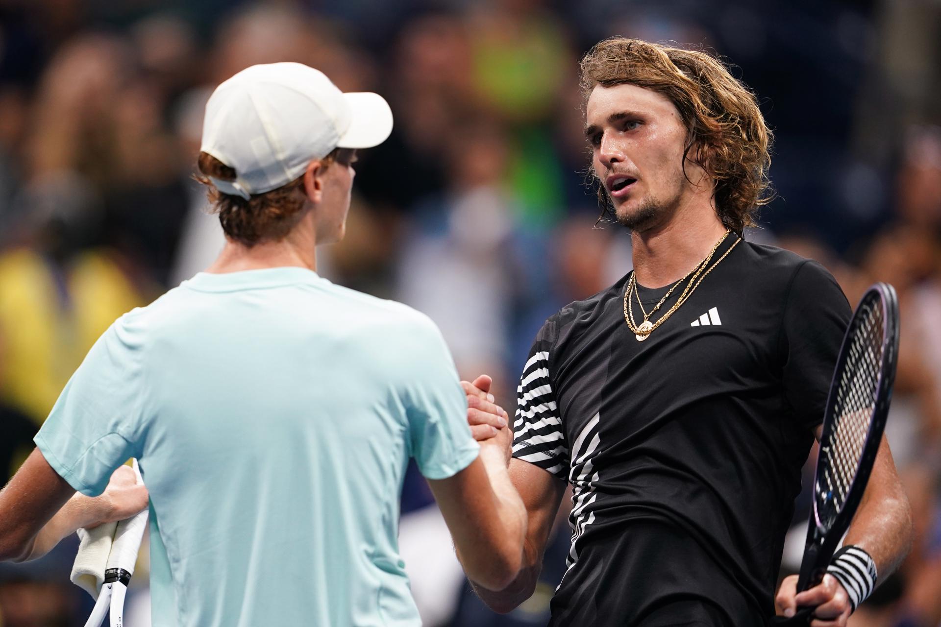 Alexander Zverev of Germany (R) embraces Jannik Sinner of Italy after winning their fourth round match at the US Open Tennis Championships at the USTA National Tennis Center in Flushing Meadows, New York, USA, 04 September 2023. EFE-EPA/WILL OLIVER
