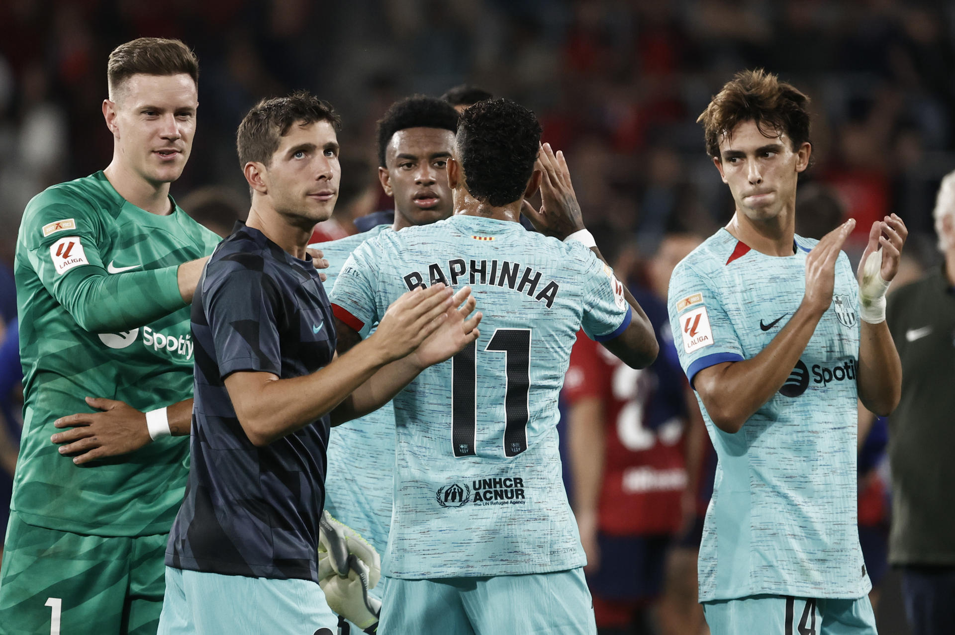 The FC Barcelona players celebrate their victory at the end of the the La Liga match against Osasuna in Pamplona, Spain, Sep 3 2023. EFE/ Jesus Diges
