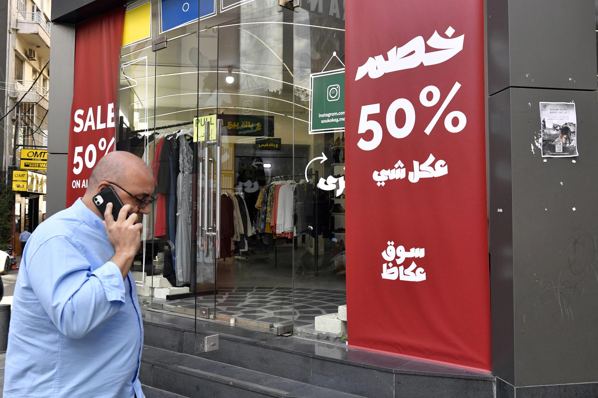 A store displays advertising in Arabic that reads '50 percent Sale on everything' in Beirut, Lebanon, 06 March 2023. EFE-EPA/FILE/WAEL HAMZEH