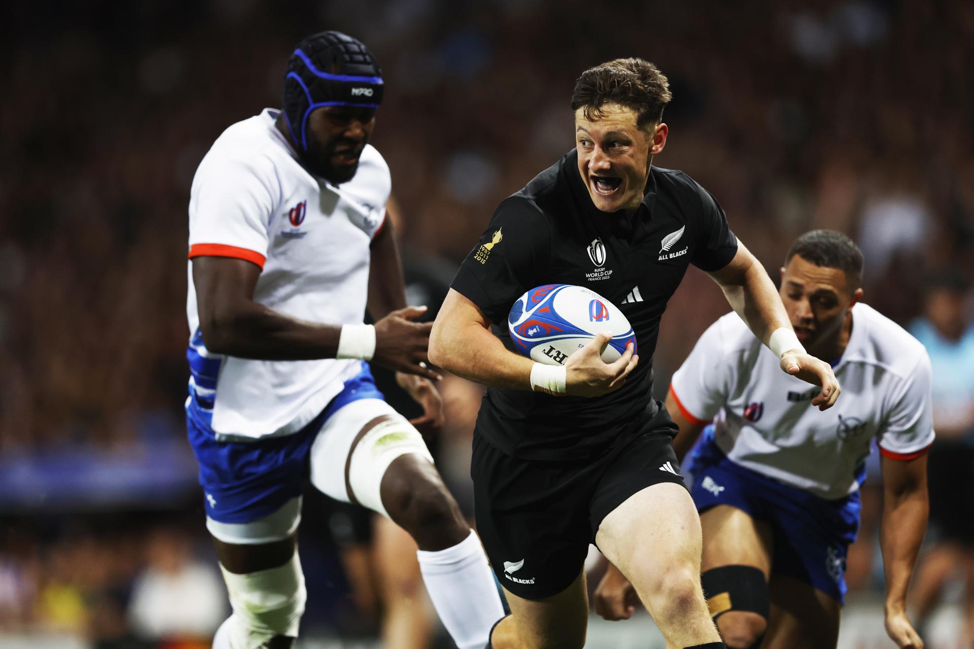 New Zealand's Cam Roigard (R) in action during the Rugby World Cup Pool A match between New Zealand and Namibia in Toulouse, France, 15 September 2023. EFE-EPA/GUILLAUME HORCAJUELO