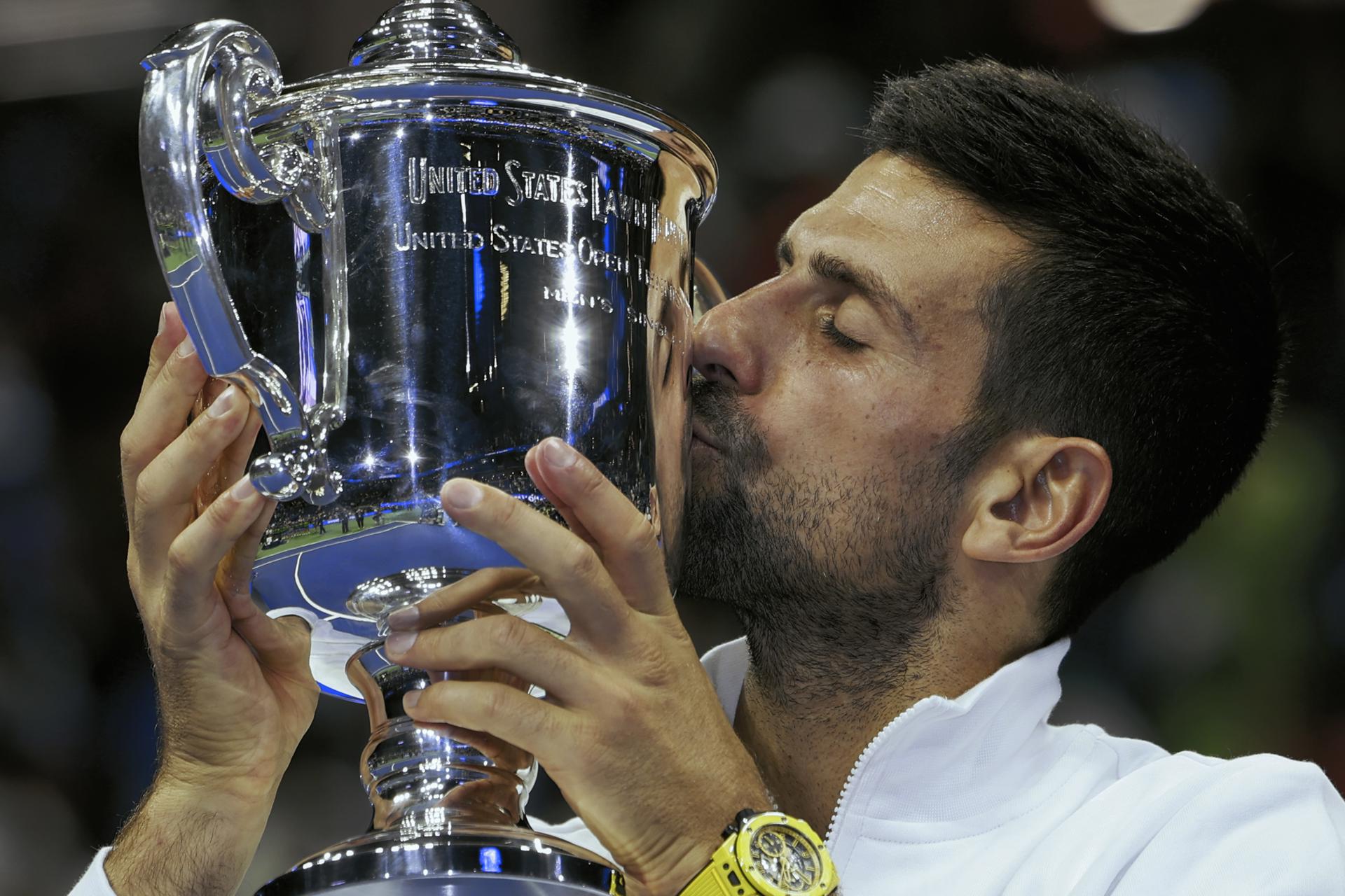 Novak Djokovic of Serbia kisses his trophy after he won against Daniil Medvedev of Russia in their Men's Final match at the US Open Tennis Championships at the Flushing Meadows, New York, USA, 10 September 2023. EFE/EPA/CJ GUNTHER