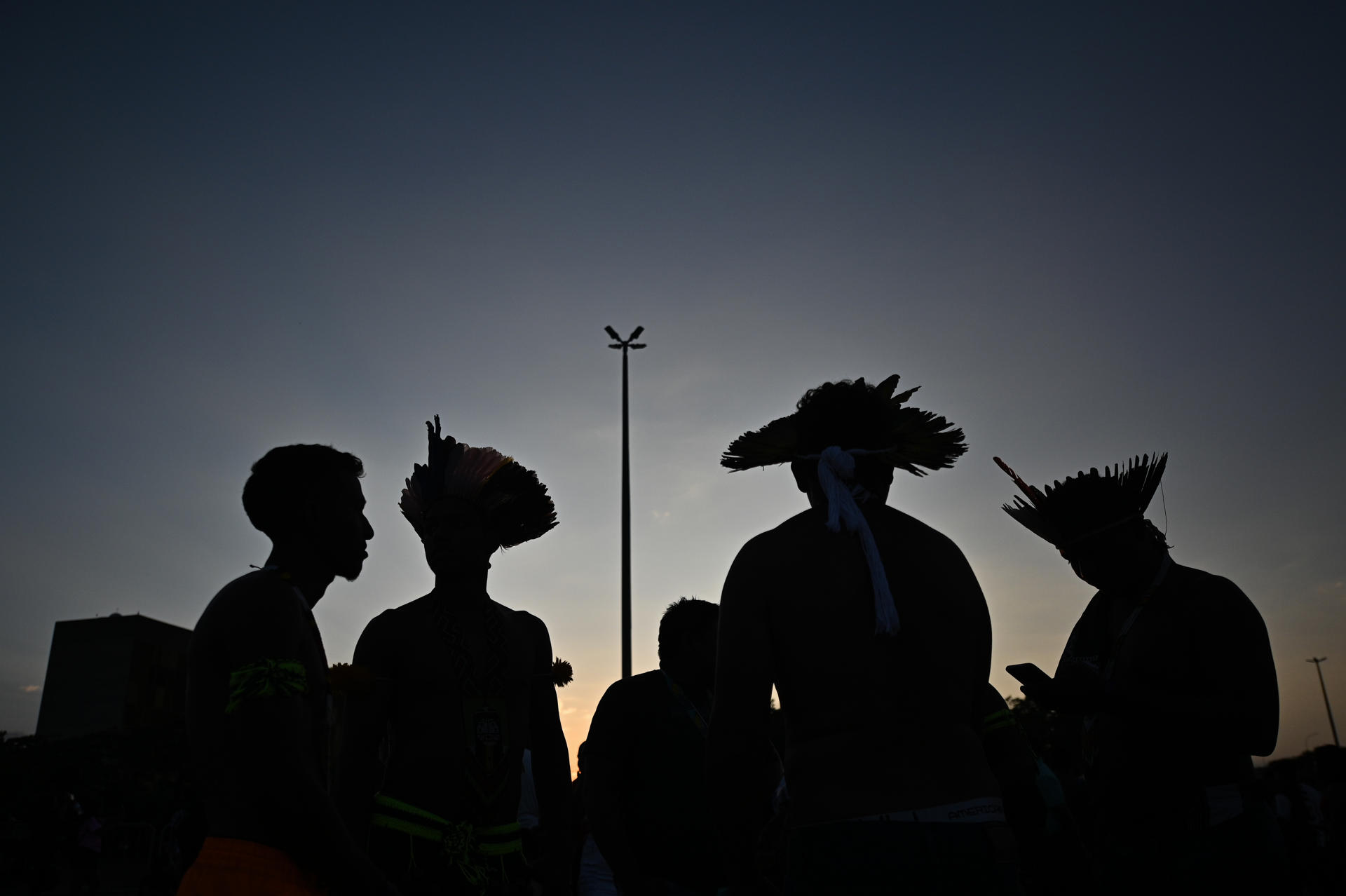 Indigenous people watched the broadcast of the "Temporary Framework" trial on a giant screen set up in front of the Supreme Federal Court in Brasilia, Brazil, September 20 2023. EFE/André Borges