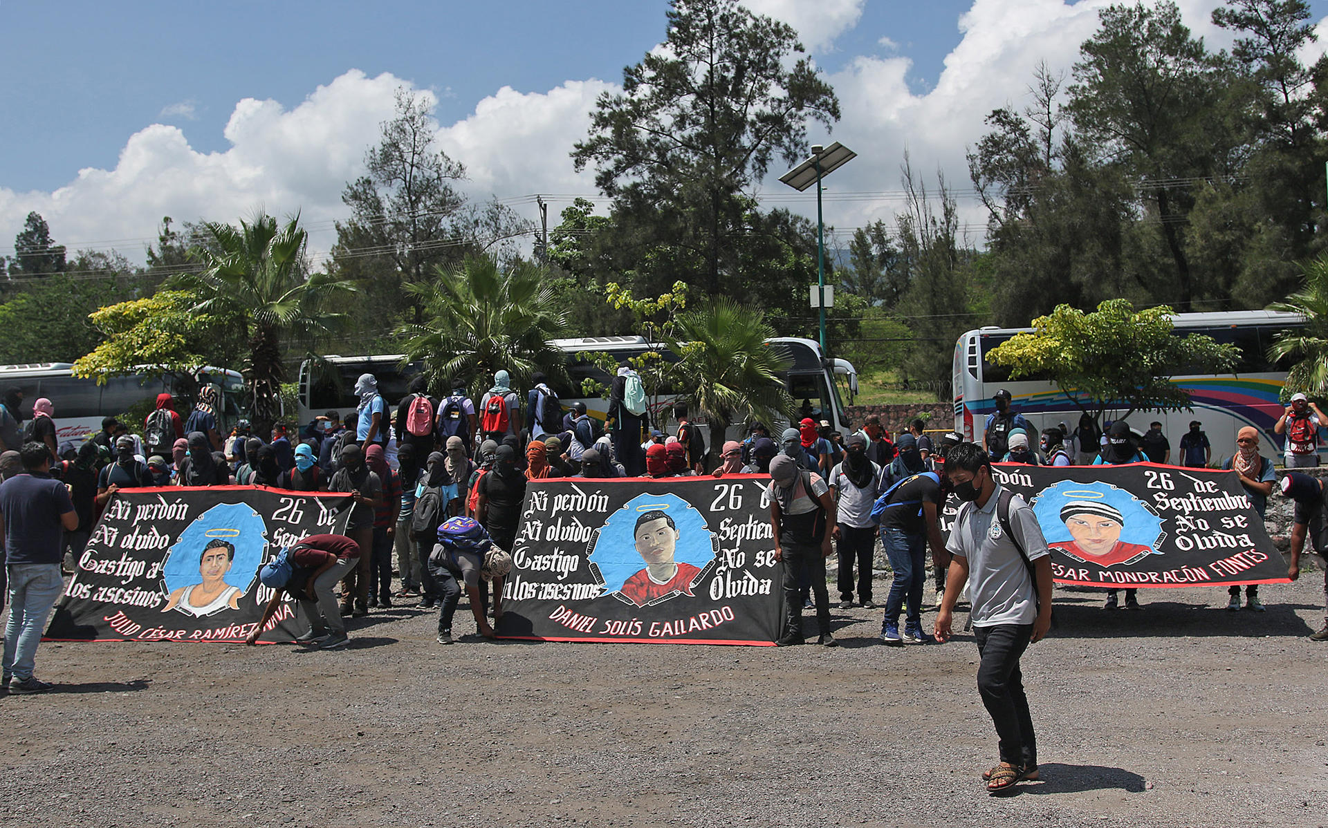 Students demonstrate hooded in front of a military barracks to demand justice for the 43 missing students from Ayotzinapa, in Chilpancingo, state of Guerrero, Mexico, 14 September 2023. EFE/José Luis de la Cruz
