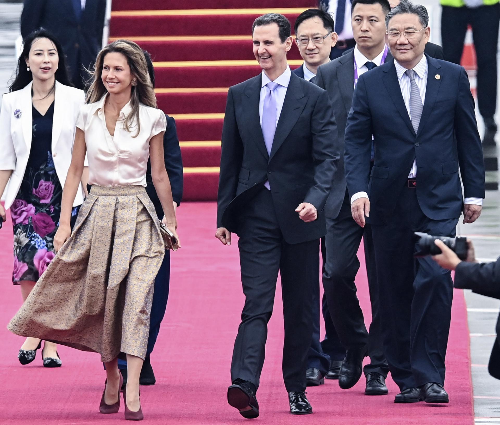 Syrian President Bashar al-Assad (4-R) and his spouse Asma al-Assad (2-L) arrive in Hangzhou, China, 21 September 2023. Al-Assad arrived on 21 Sepotember in China to attend the opening ceremony of the 19th Asian Games. (Siria) EFE/EPA/XINHUA / Xu Yu CHINA OUT / UK AND IRELAND OUT / MANDATORY CREDIT EDITORIAL USE ONLY
