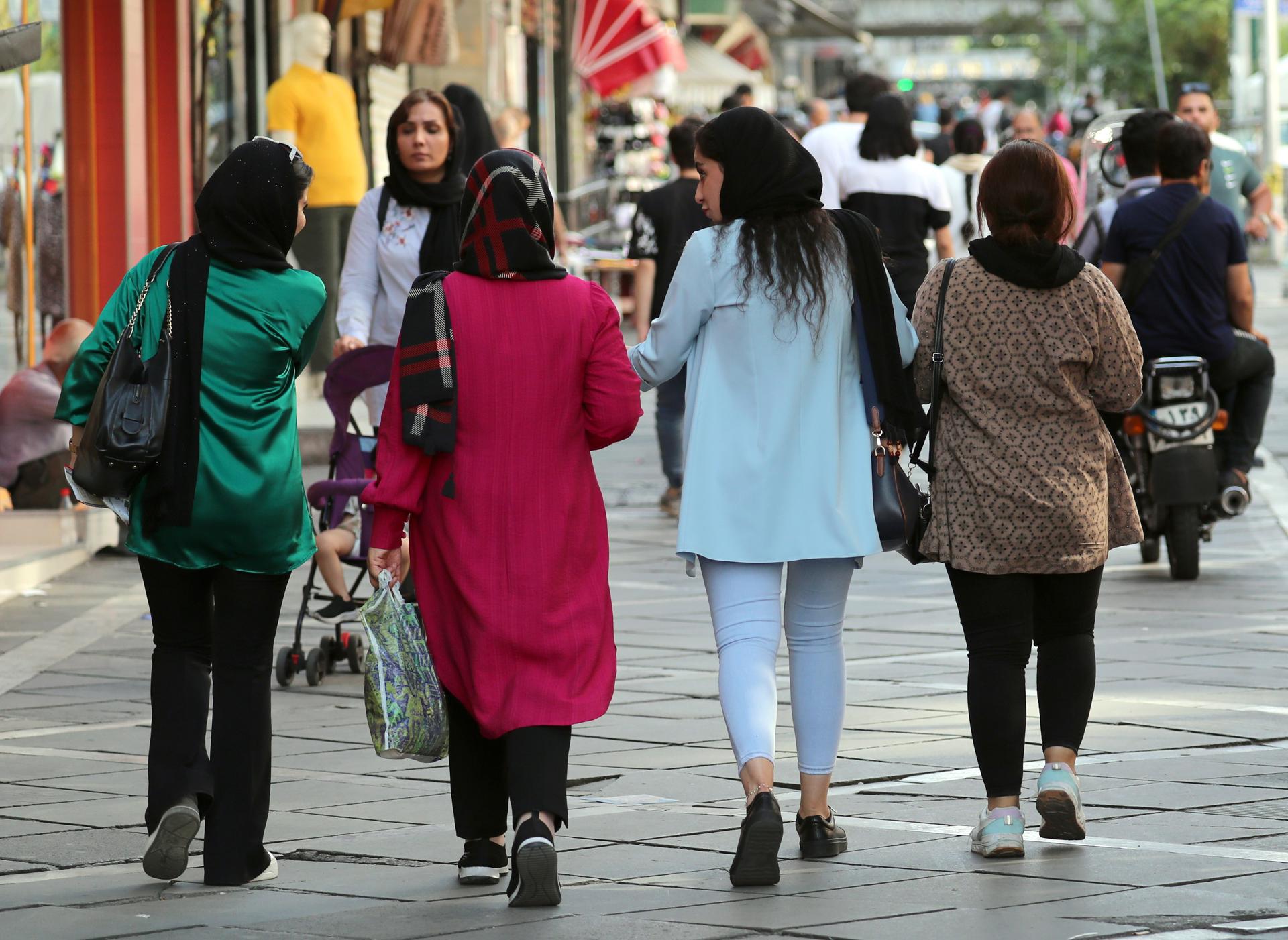 Iranian women walk in the street, some wearing a headscarf in Tehran, Iran, 10 August 2023. EFE/EPA/FILE/ABEDIN TAHERKENAREH