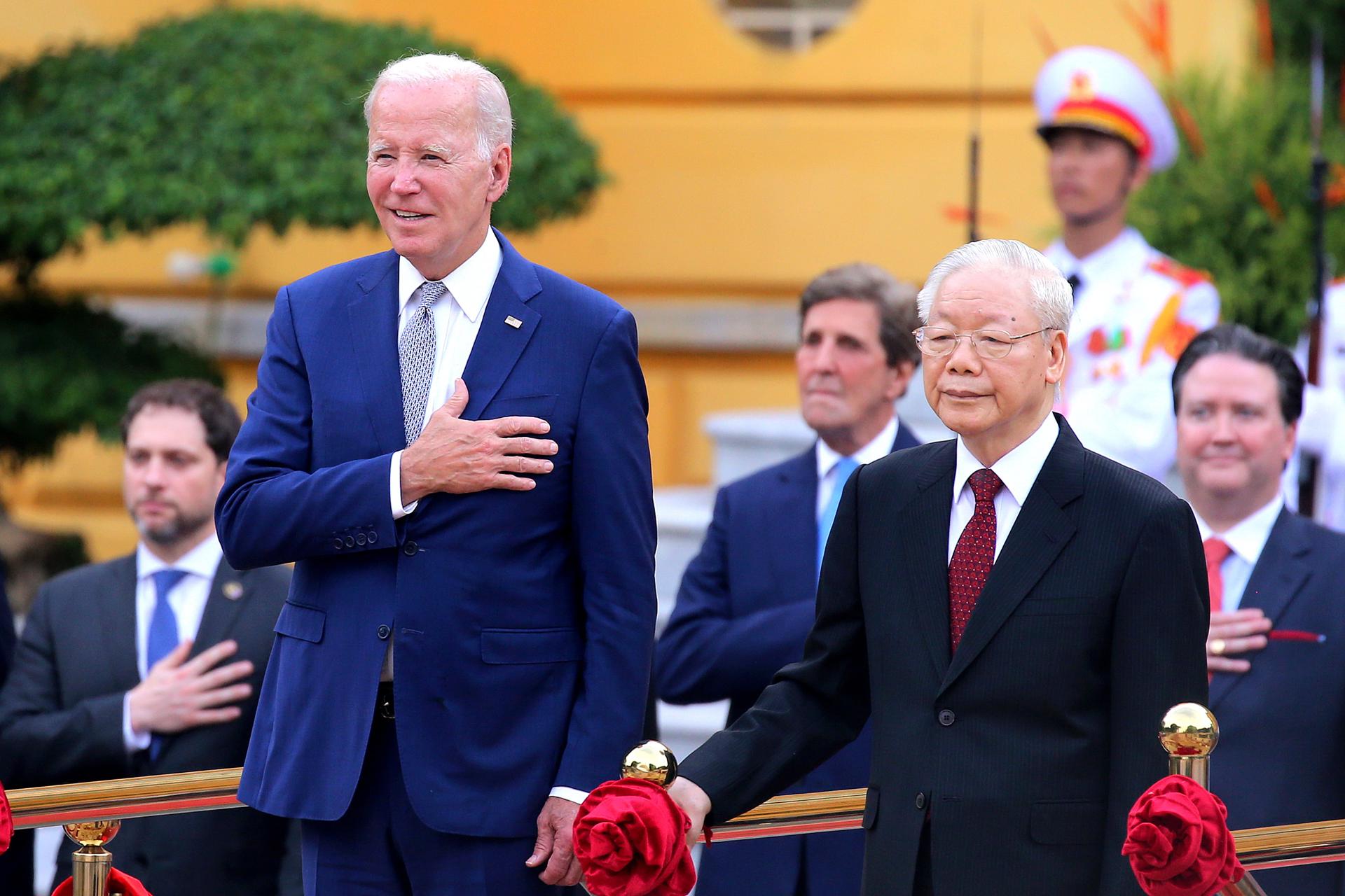 Vietnamese General Secretary of the Communist Party Nguyen Phu Trong (R) and US President Joe Biden (L) review the guard of honor at the Presidential Palace in Hanoi, Vietnam, 10 September 2023. Biden is on an official two-day visit to Vietnam. EFE/EPA/LUONG THAI LINH / POOL