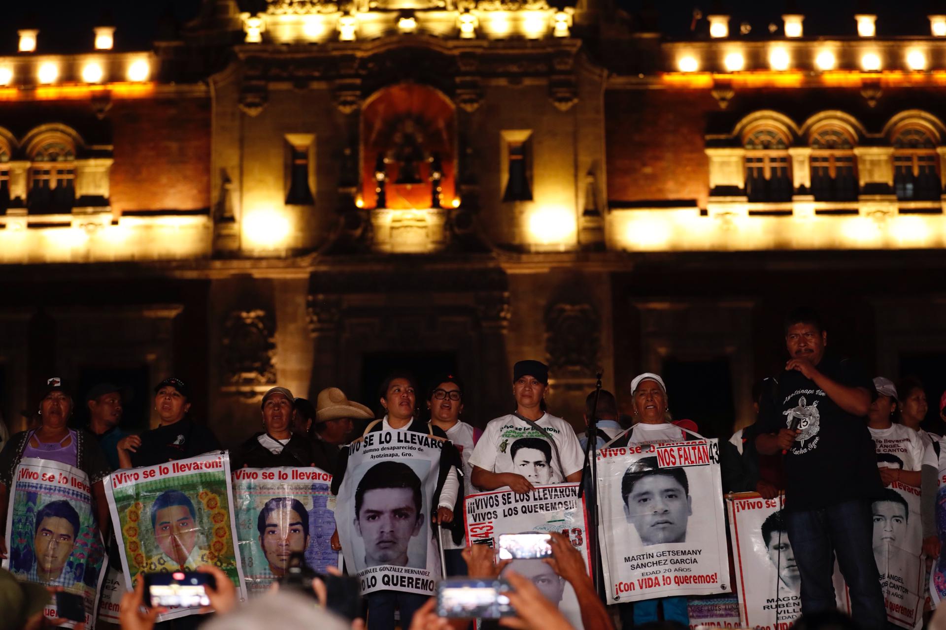 Fathers and mothers of the 43 young people who disappeared from Ayotzinapa in September 2014 and students from the rural school, located in the southern state of Guerrero, hold a massive demonstration to commemorate the ninth anniversary of the 43 missing Mexicans from Ayotzinapa, in Mexico City, Mexico, 26 Septemeber 2023. EFE-EPA/Sáshenka Gutiérrez