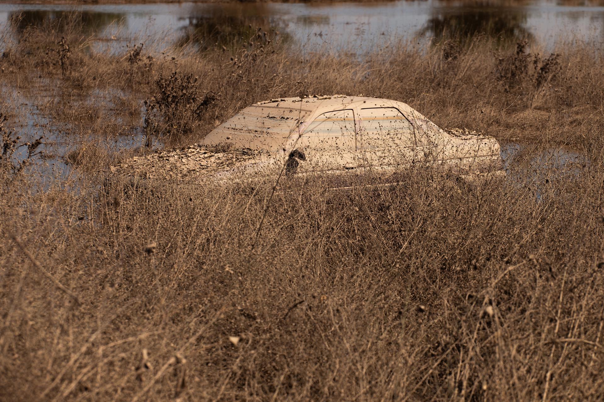 A car coverd with mud in Rizovouni, near Karditsa, after storm 'Daniel' swept across central Greece, 11 September 2023. EFE/EPA/ACHILEAS CHIRAS

