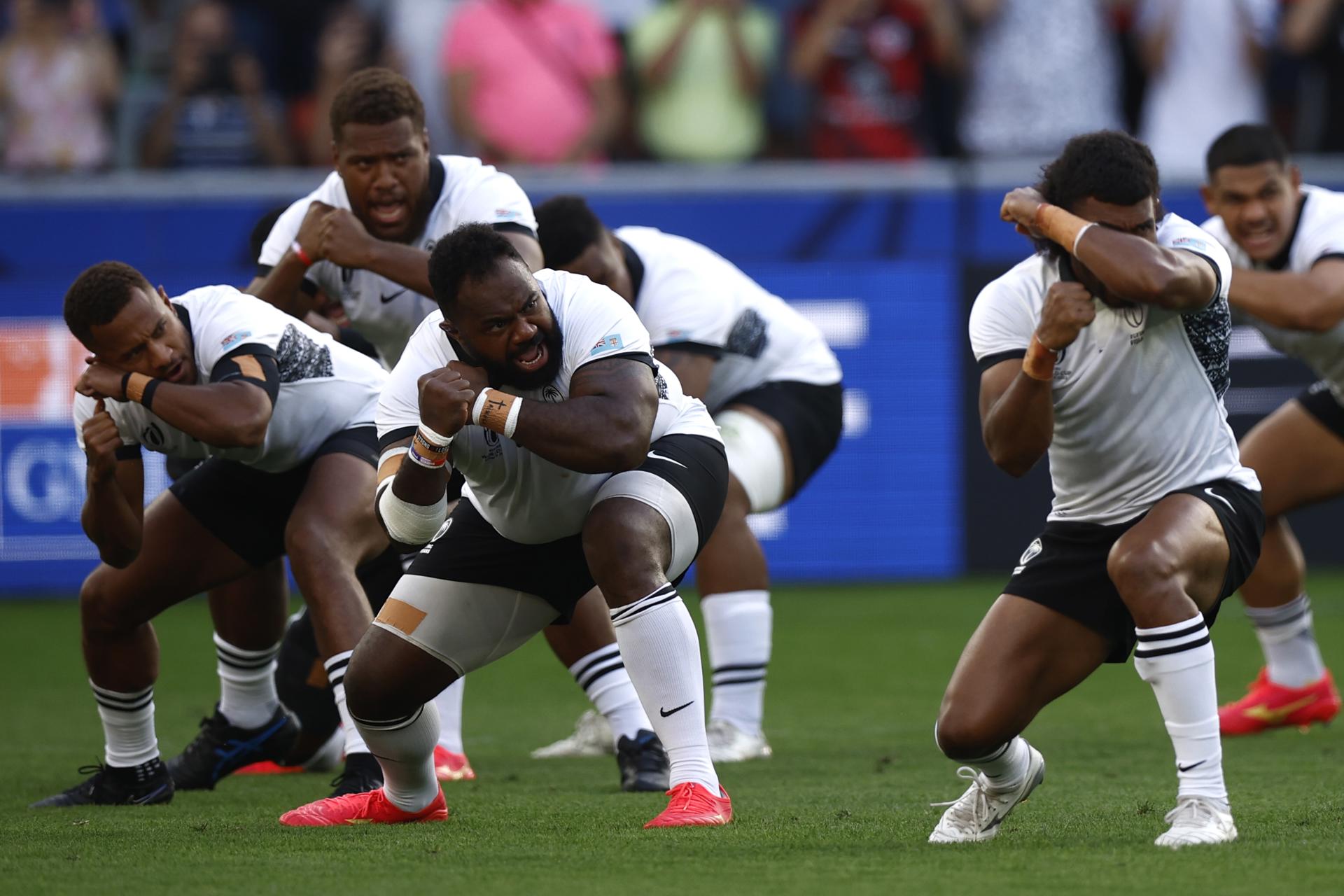 Fijians players perform the Cibi before the Rugby World Cup Pool C match between Australia and Fiji in Saint-Etienne, France, 17 September 2023. EFE-EPA/YOAN VALAT