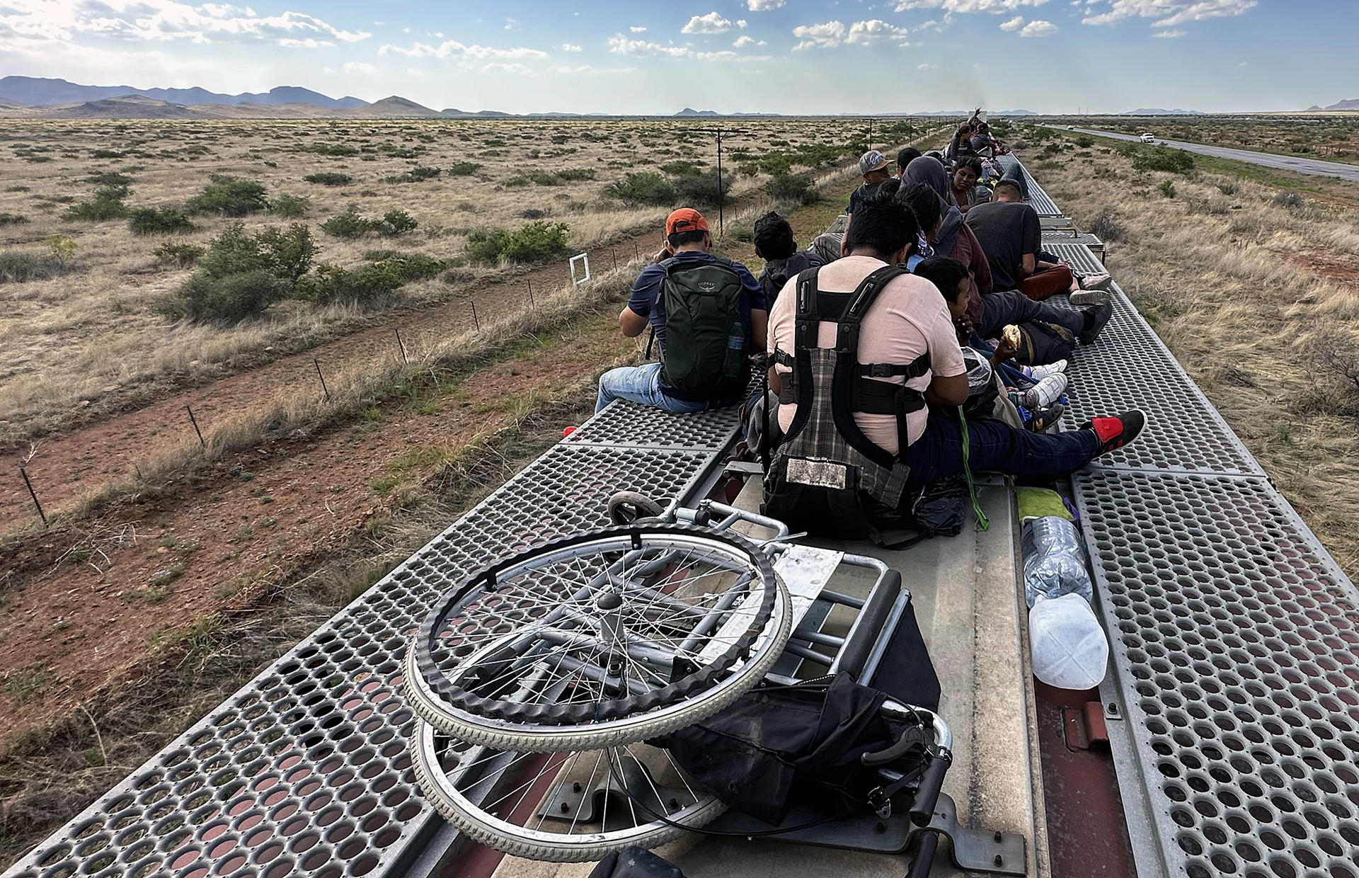 Migrants who aspiring to reach the US travel over the train know as The Beast in Ciudad Juarez, Mexico, 16 September 2023 (issued 23 September 2023). EFE/ Luis Torres