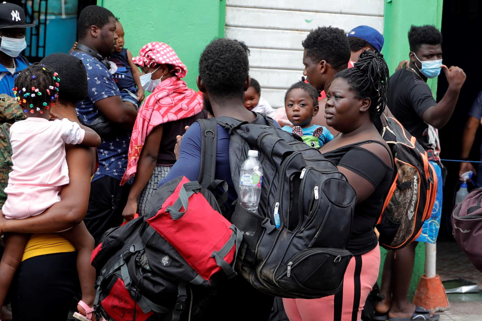 (FILE) Photo dated October 25, 2021 shows Haitian migrants waiting for intercity transportation in the city of Tegucigalpa, Honduras.EFE/ Gustavo Amador